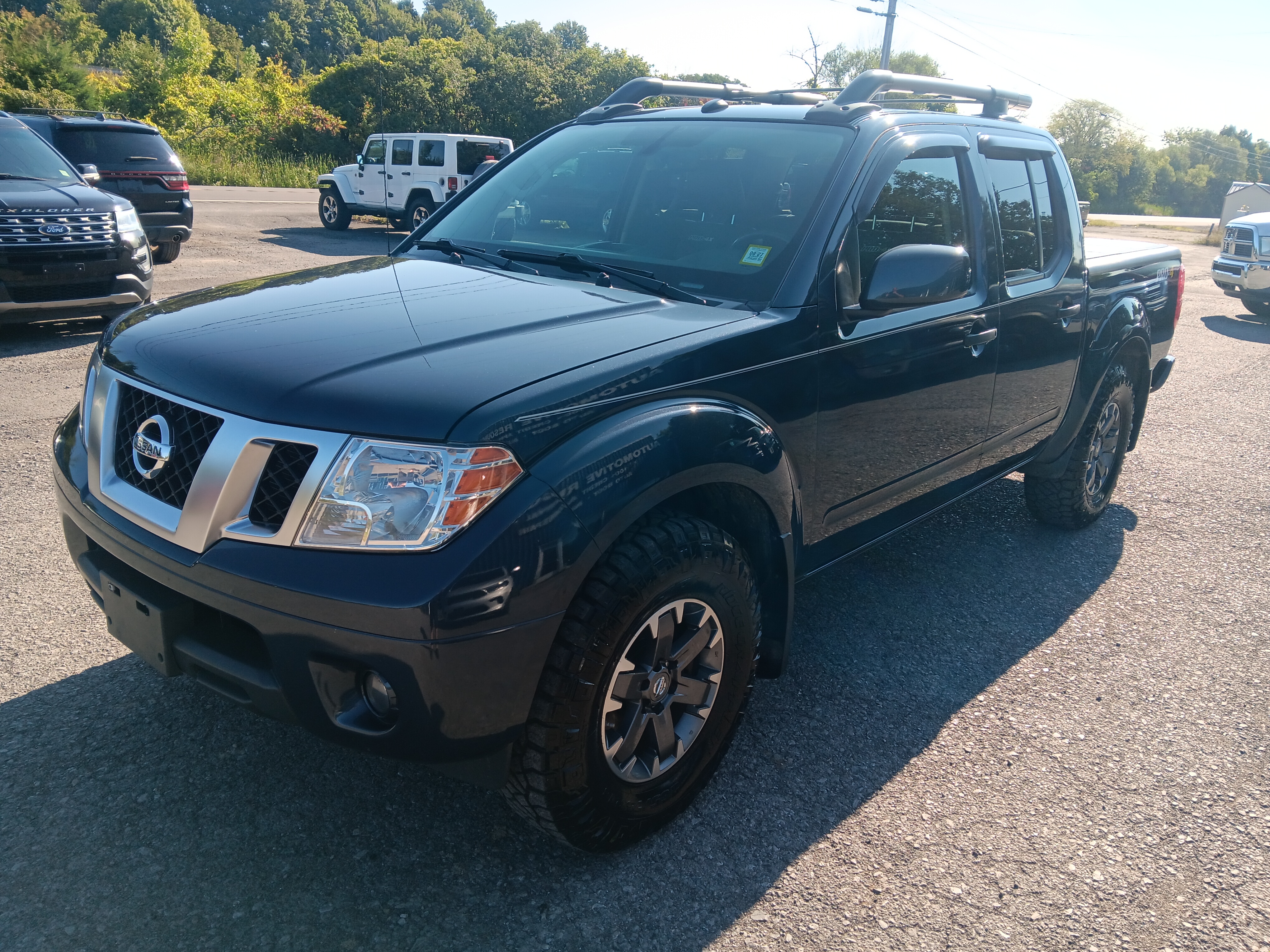 Blue 2019 Nissan Frontier Pickup Truck Four-Wheel Drive Automatic