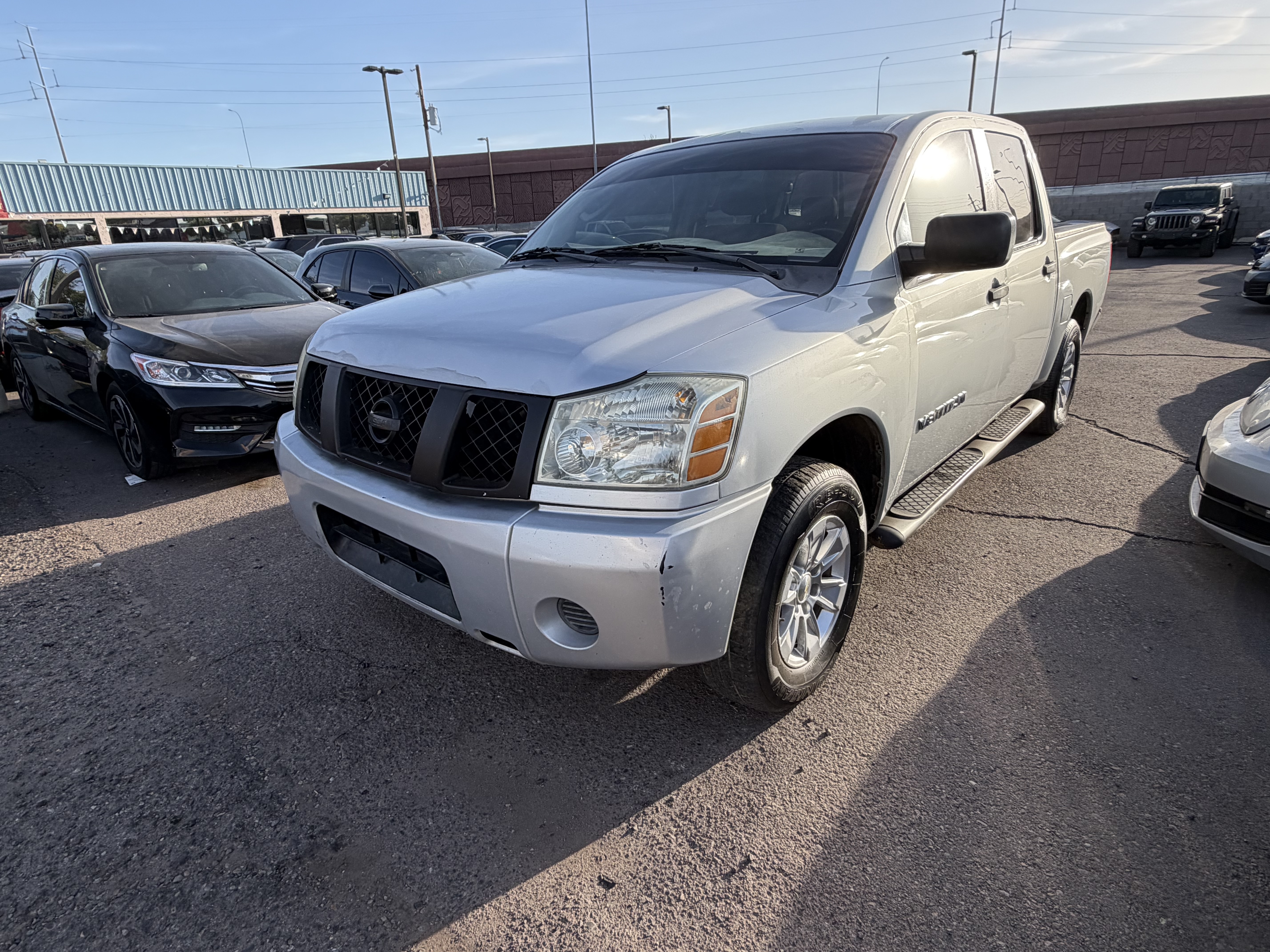 Silver 2006 Nissan Titan XE Crew Cab 2WD Pickup Truck Rear-Wheel Drive Automatic