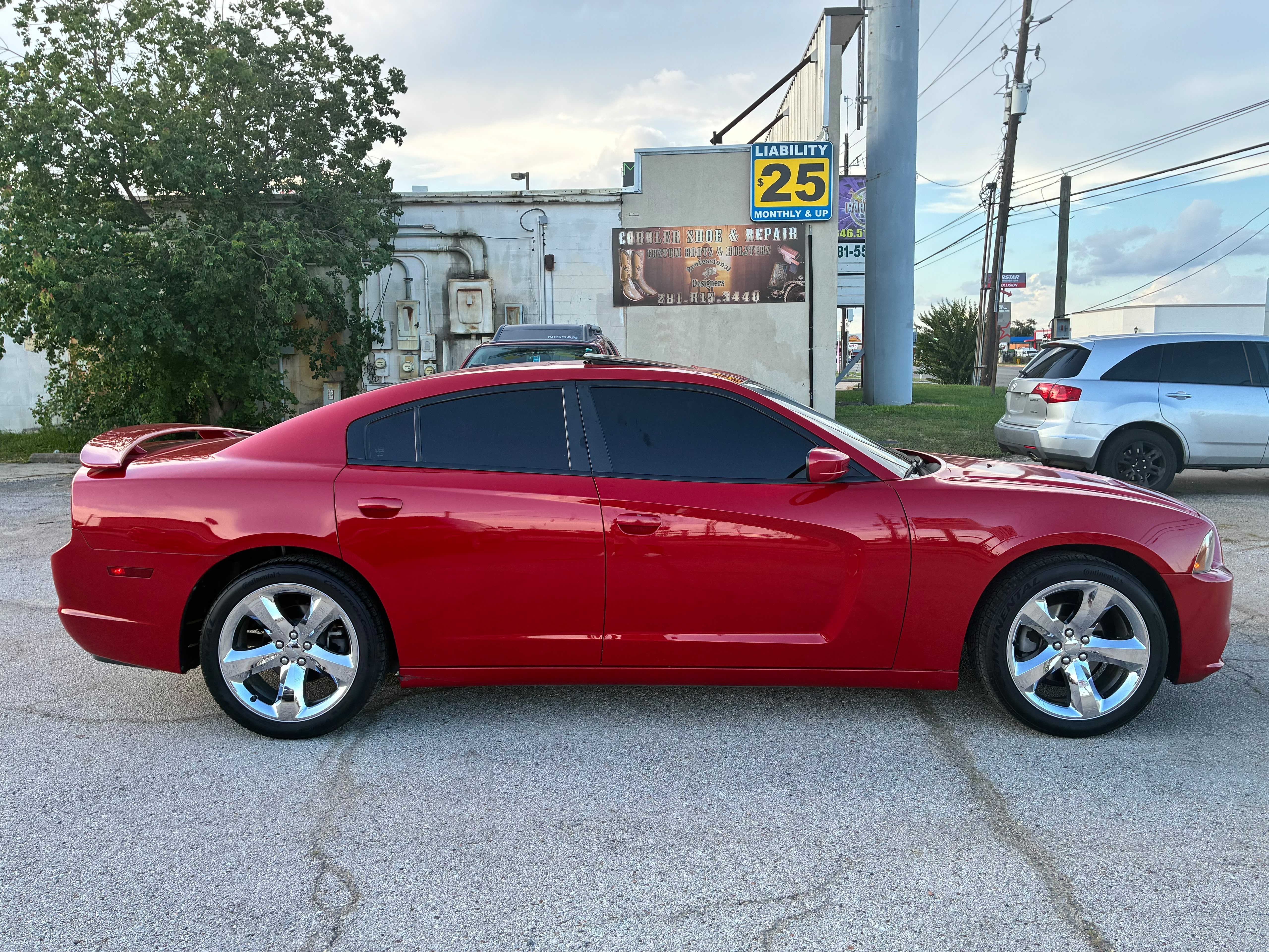 View vehicle photo 3