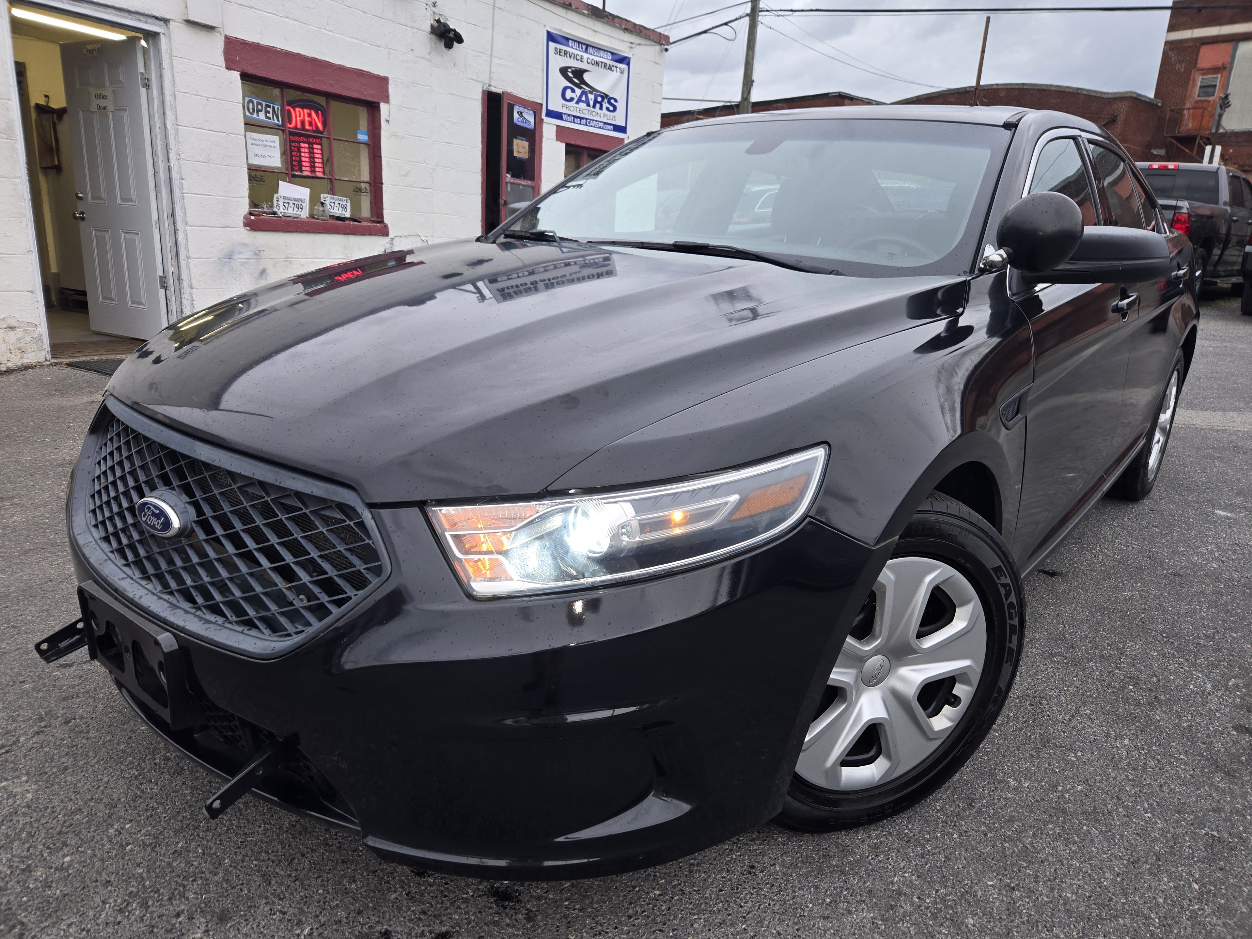 Black 2016 Ford Taurus Sedan All-Wheel Drive Automatic
