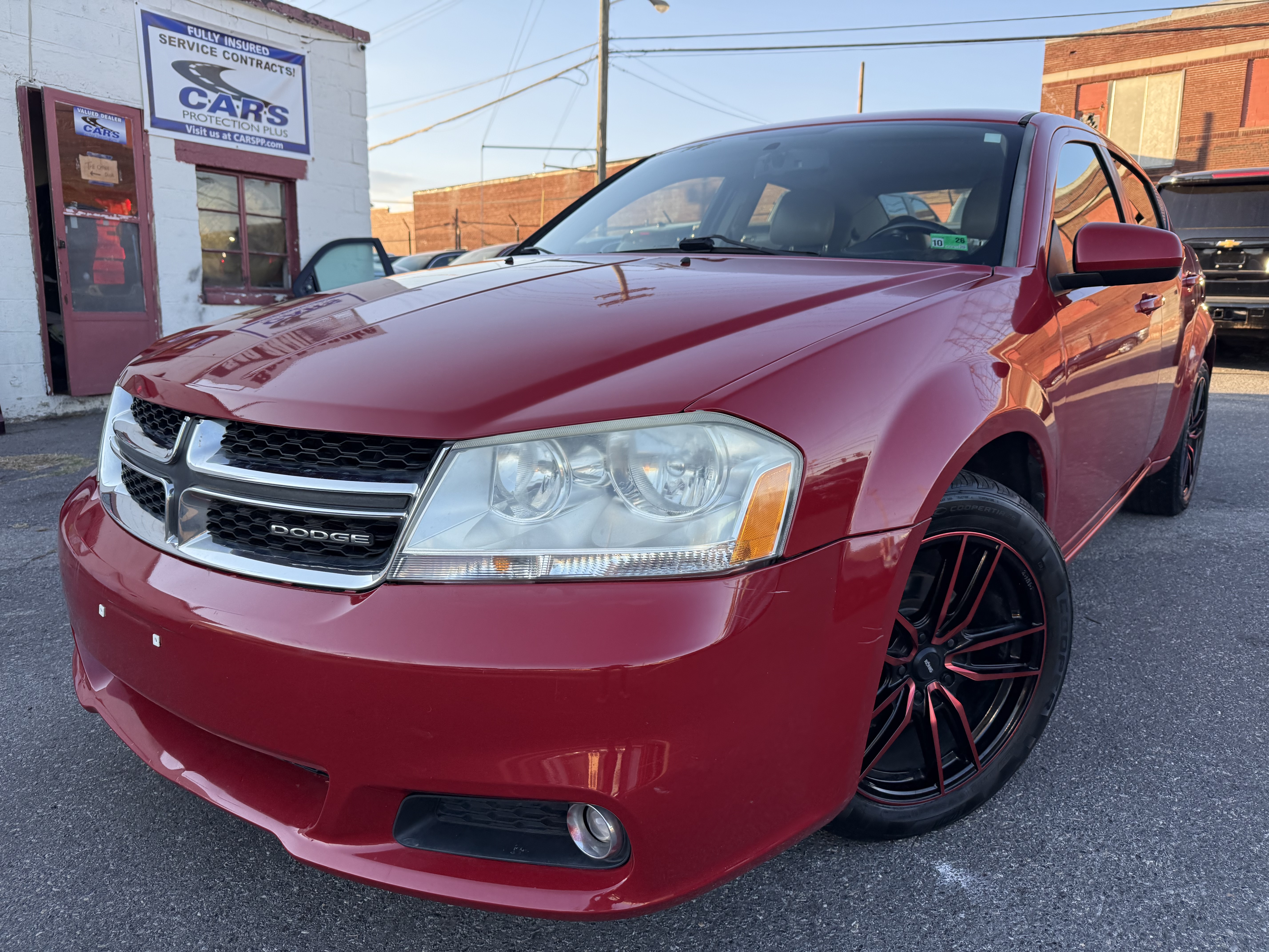 Red 2011 Dodge Avenger Sedan Front-Wheel Drive Automatic