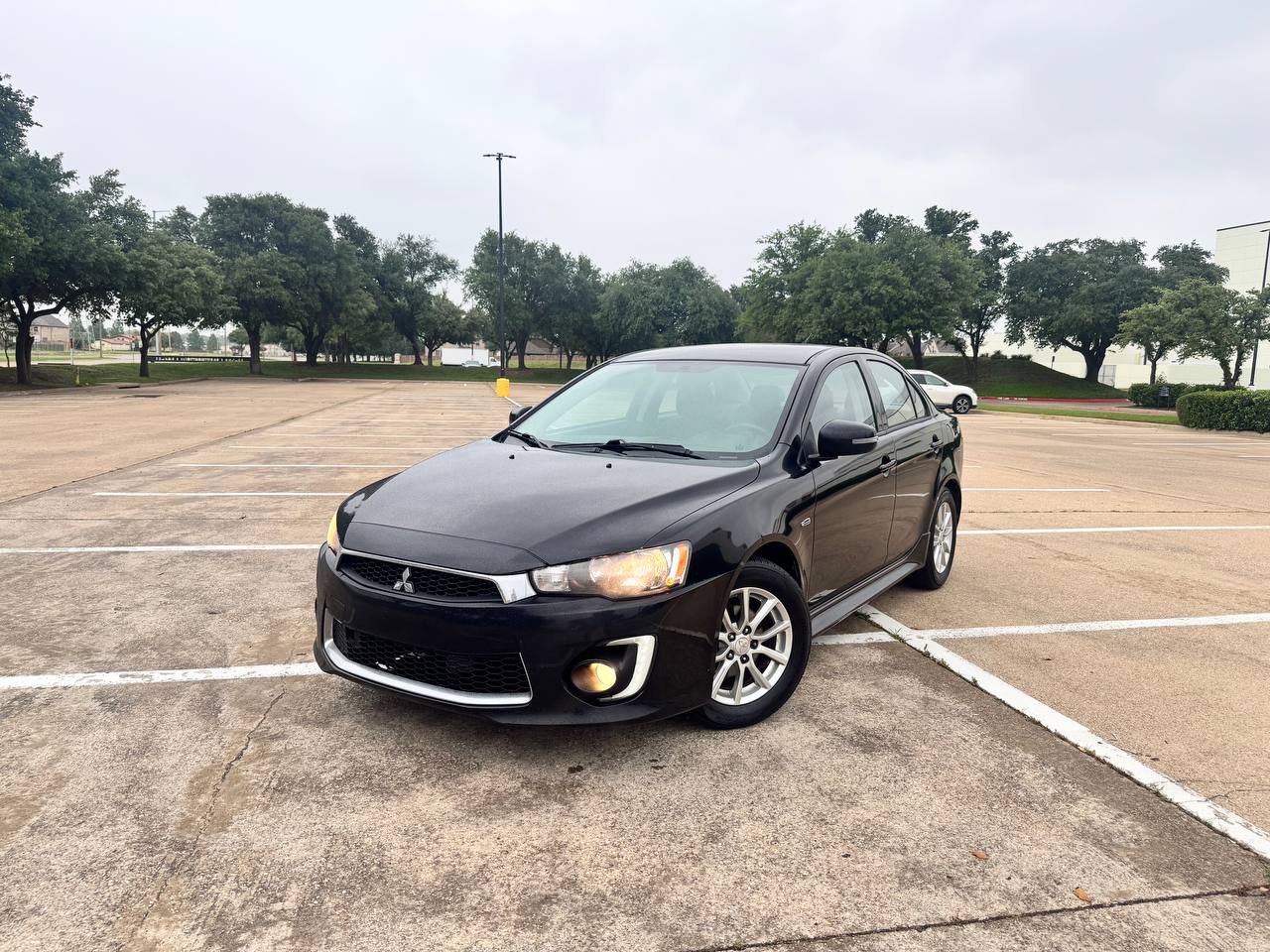 Black 2016 Mitsubishi Lancer ES FWD Sedan Front-Wheel Drive Automatic