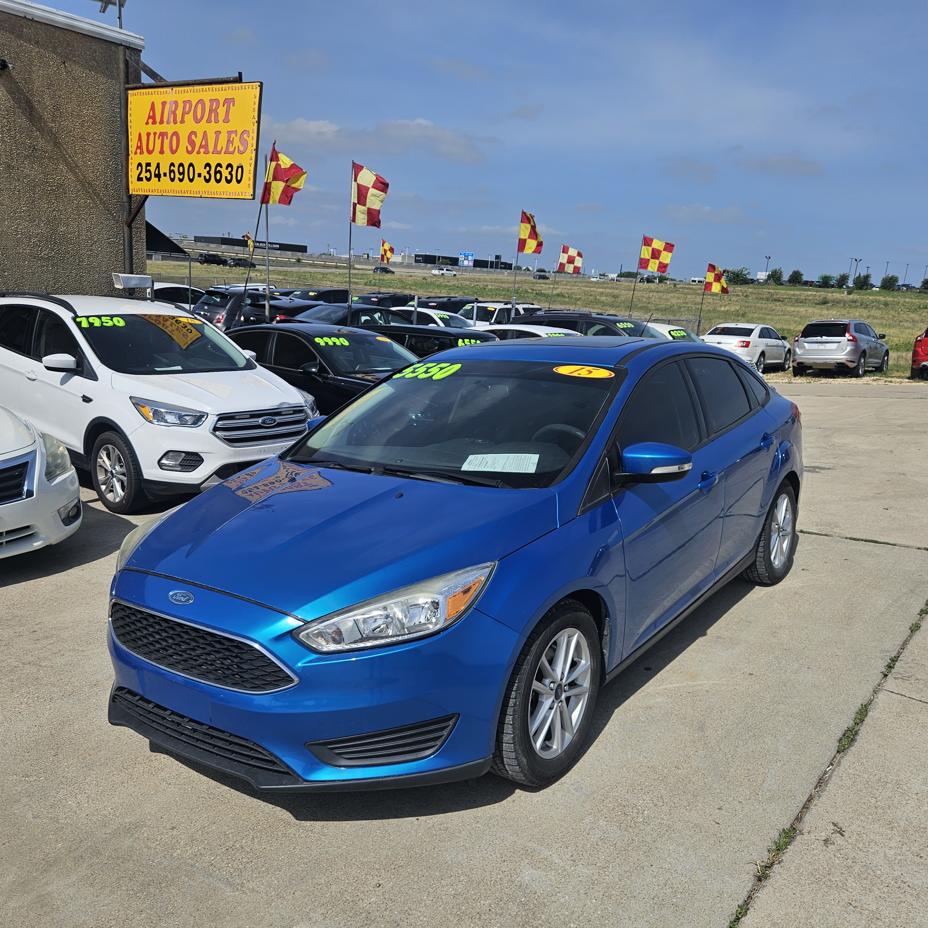 Blue 2015 Ford Focus Sedan Front-Wheel Drive Automatic