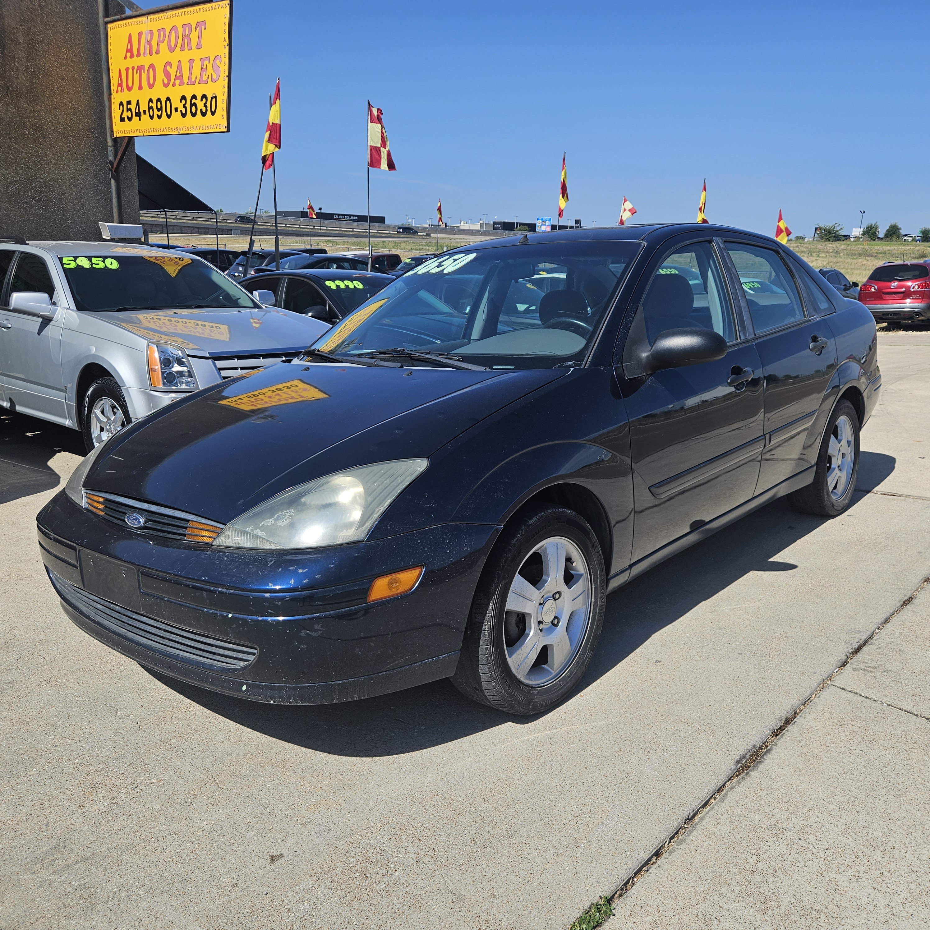Blue 2003 Ford Focus Sedan Front-Wheel Drive Manual