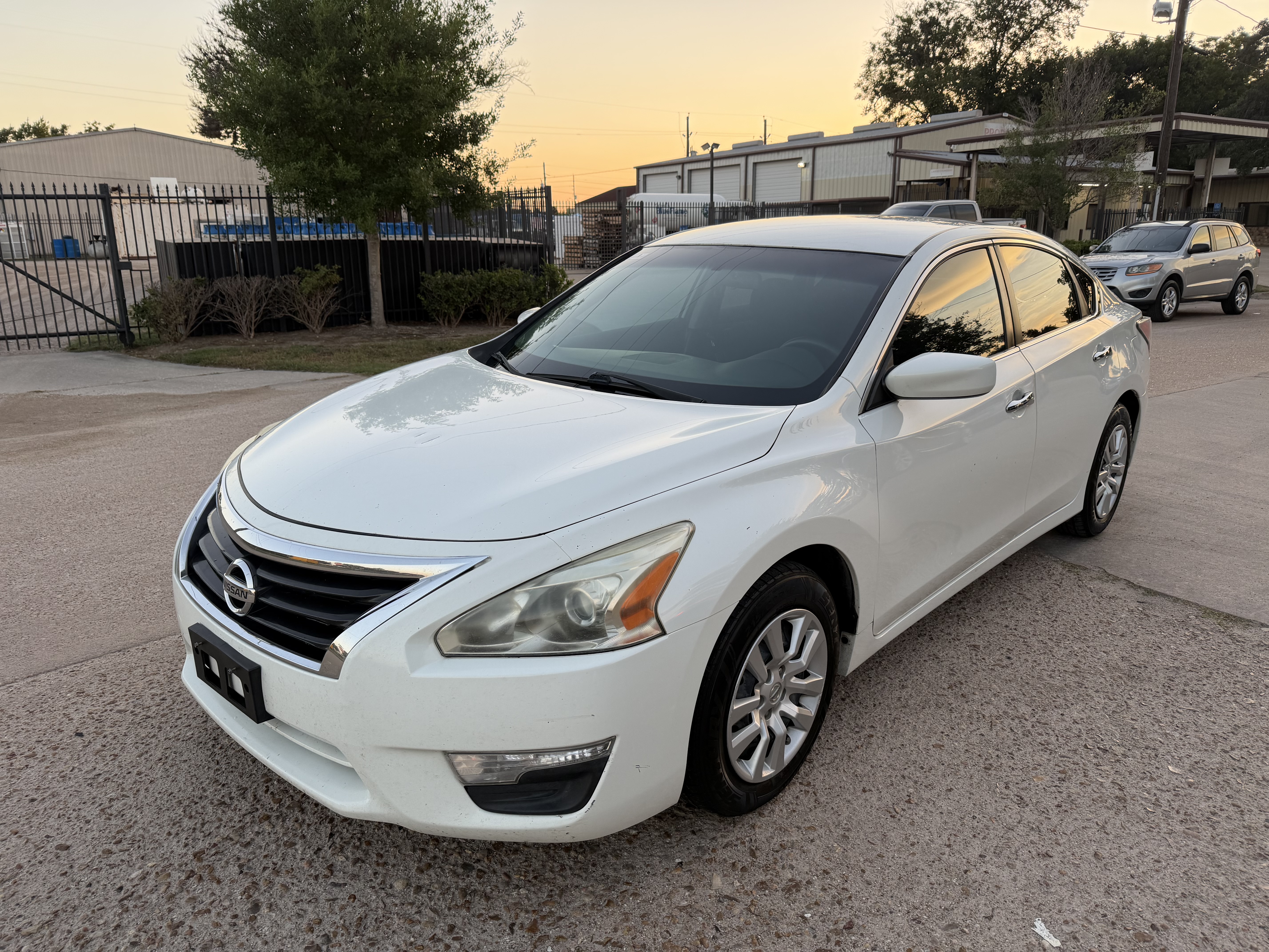White 2015 Nissan Altima Sedan Front-Wheel Drive Automatic