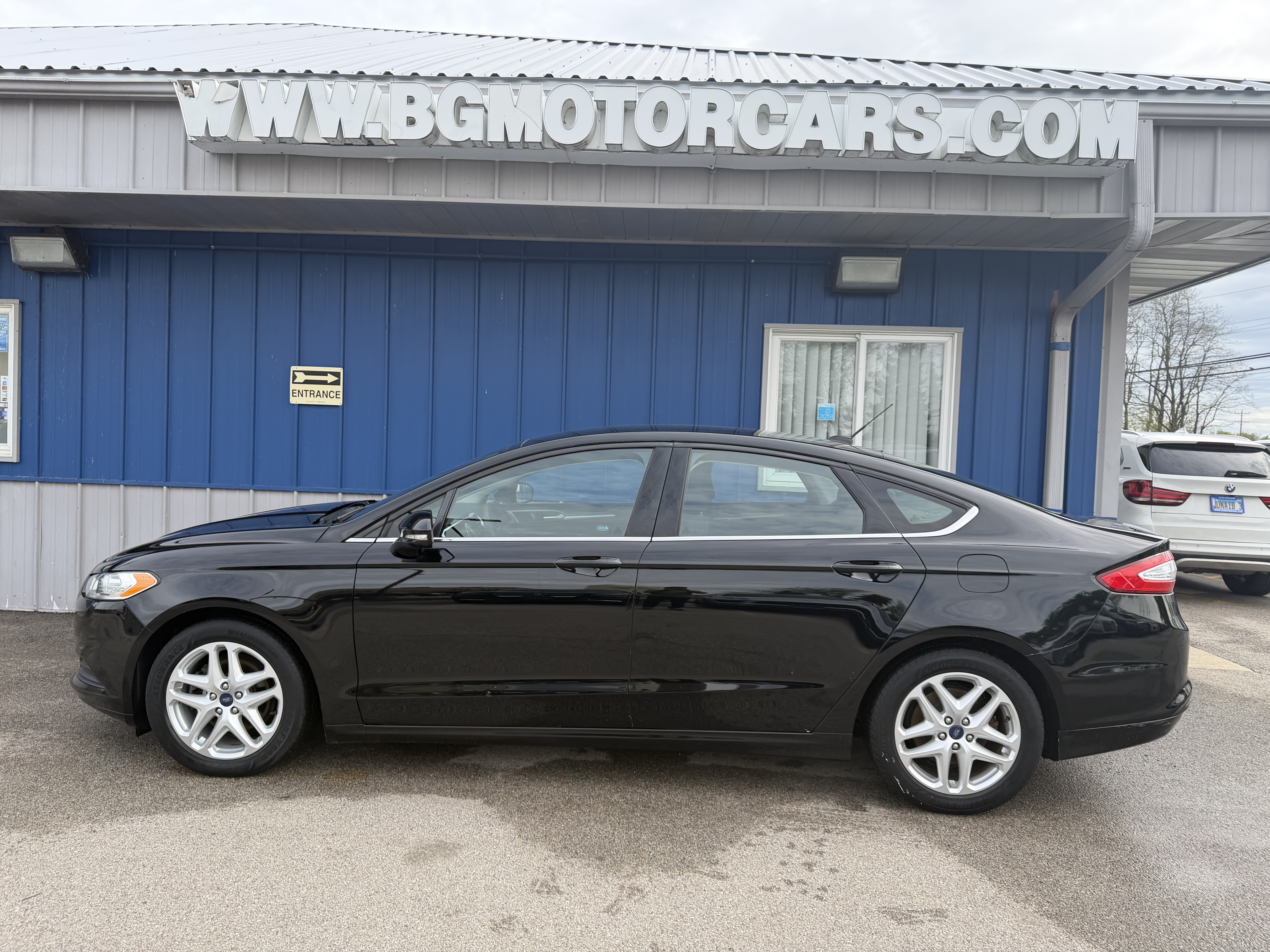 View vehicle photo 2