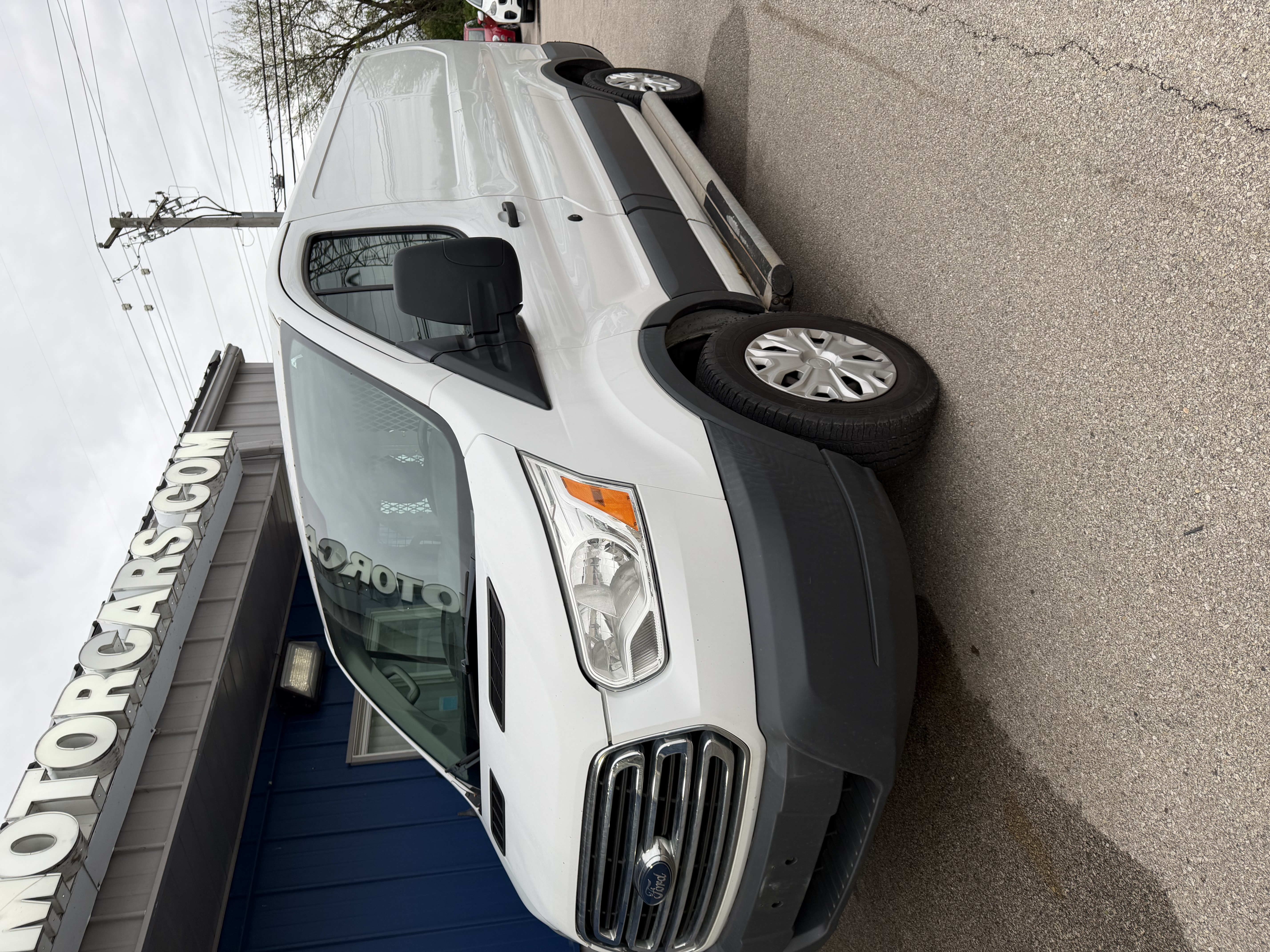 View vehicle photo 4