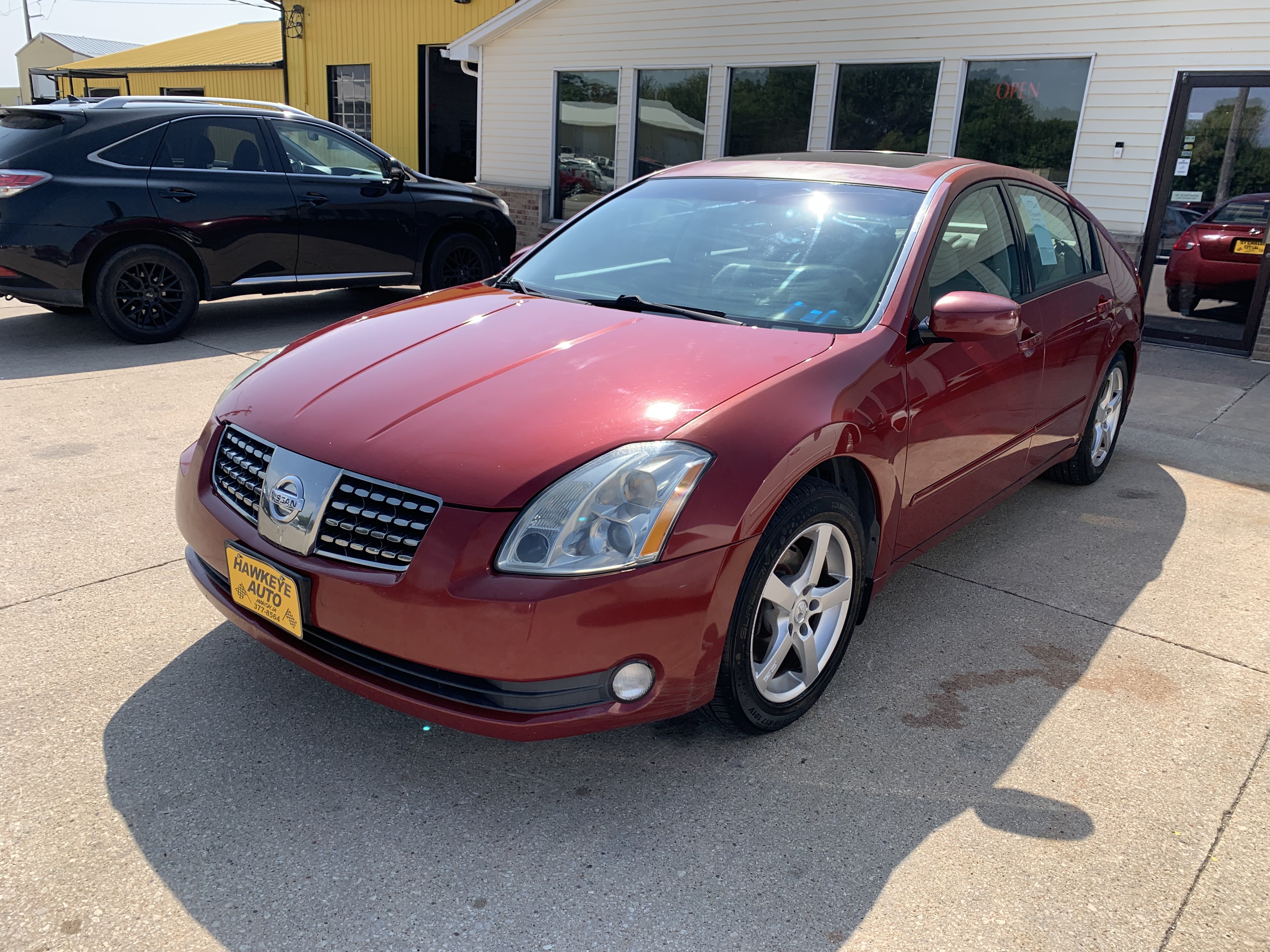 Red 2005 Nissan Maxima Sedan Front-Wheel Drive Automatic