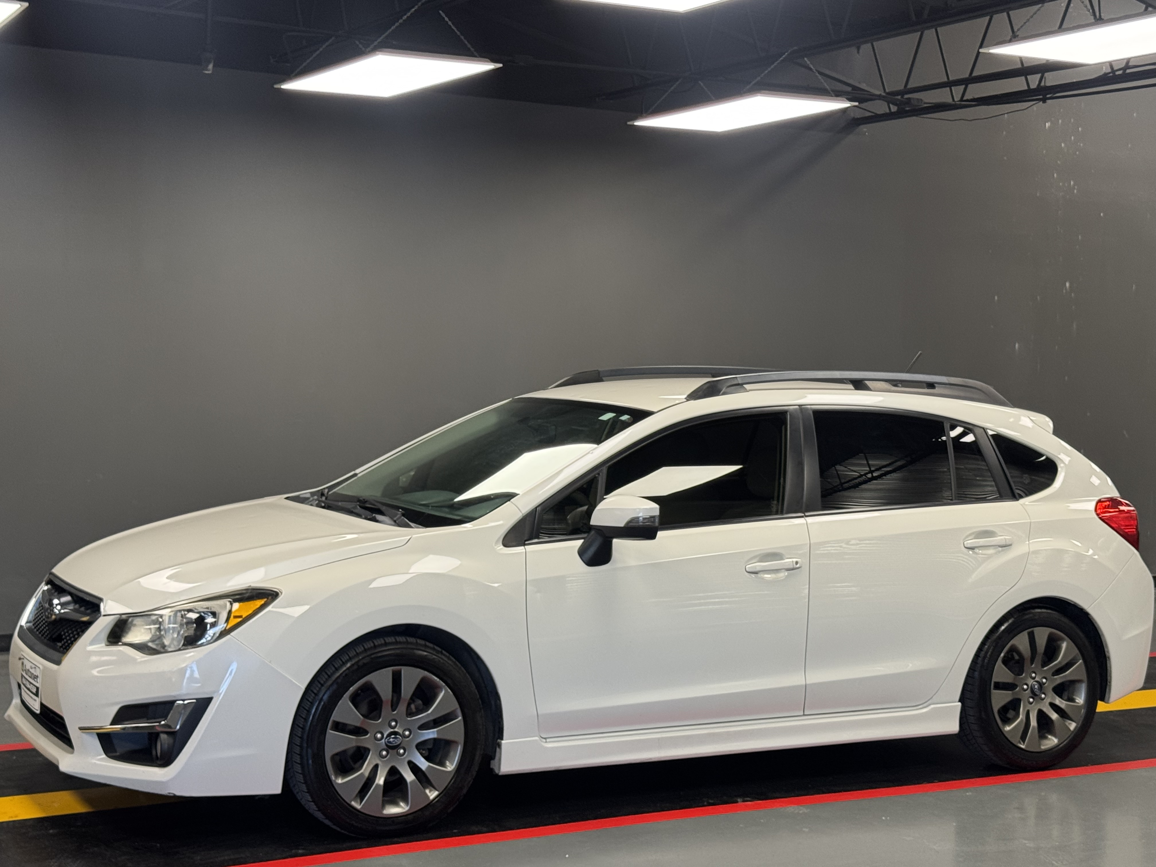 White 2015 Subaru Impreza Hatchback All-Wheel Drive Automatic