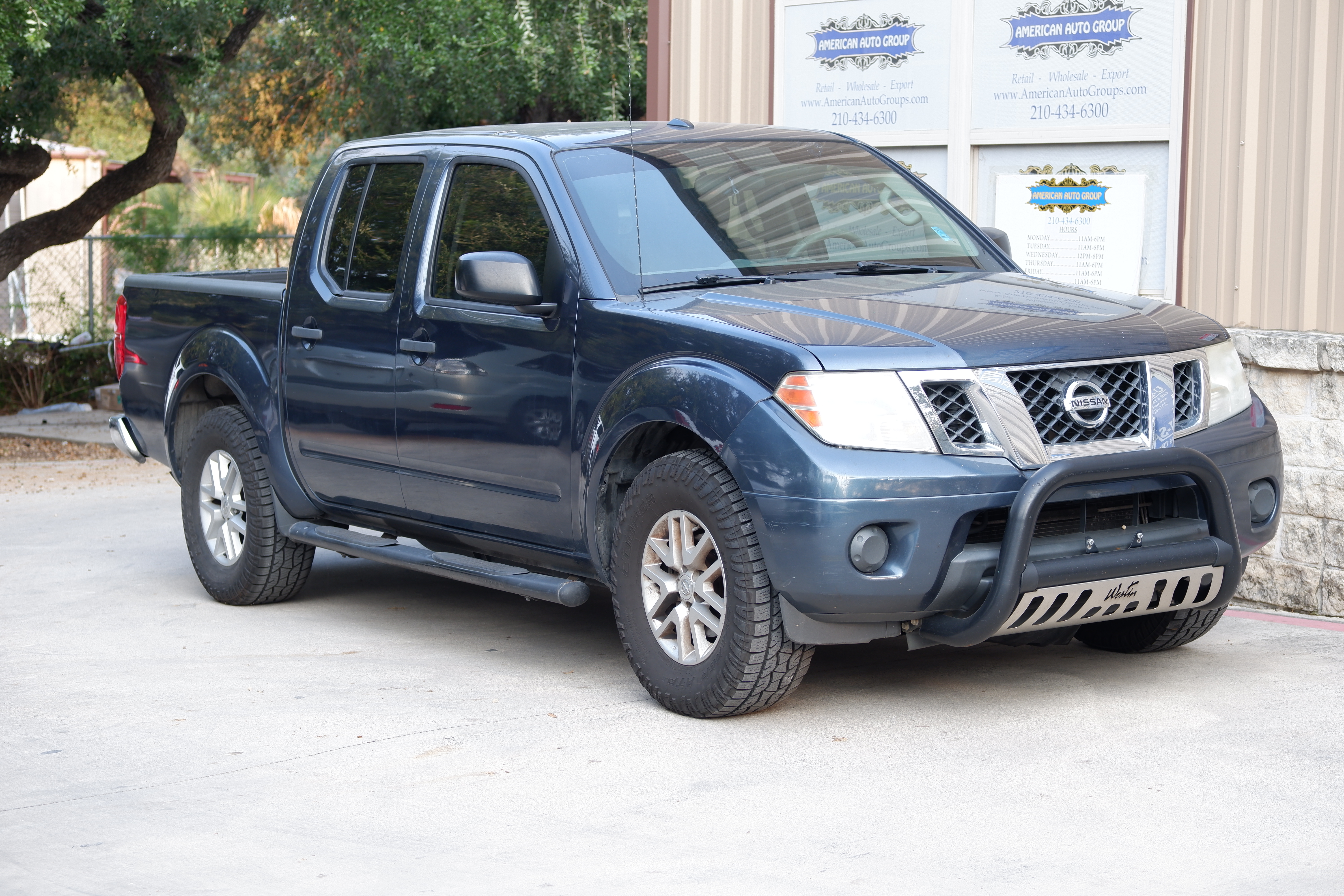 Blue 2014 Nissan Frontier Pickup Truck 4X2 Automatic