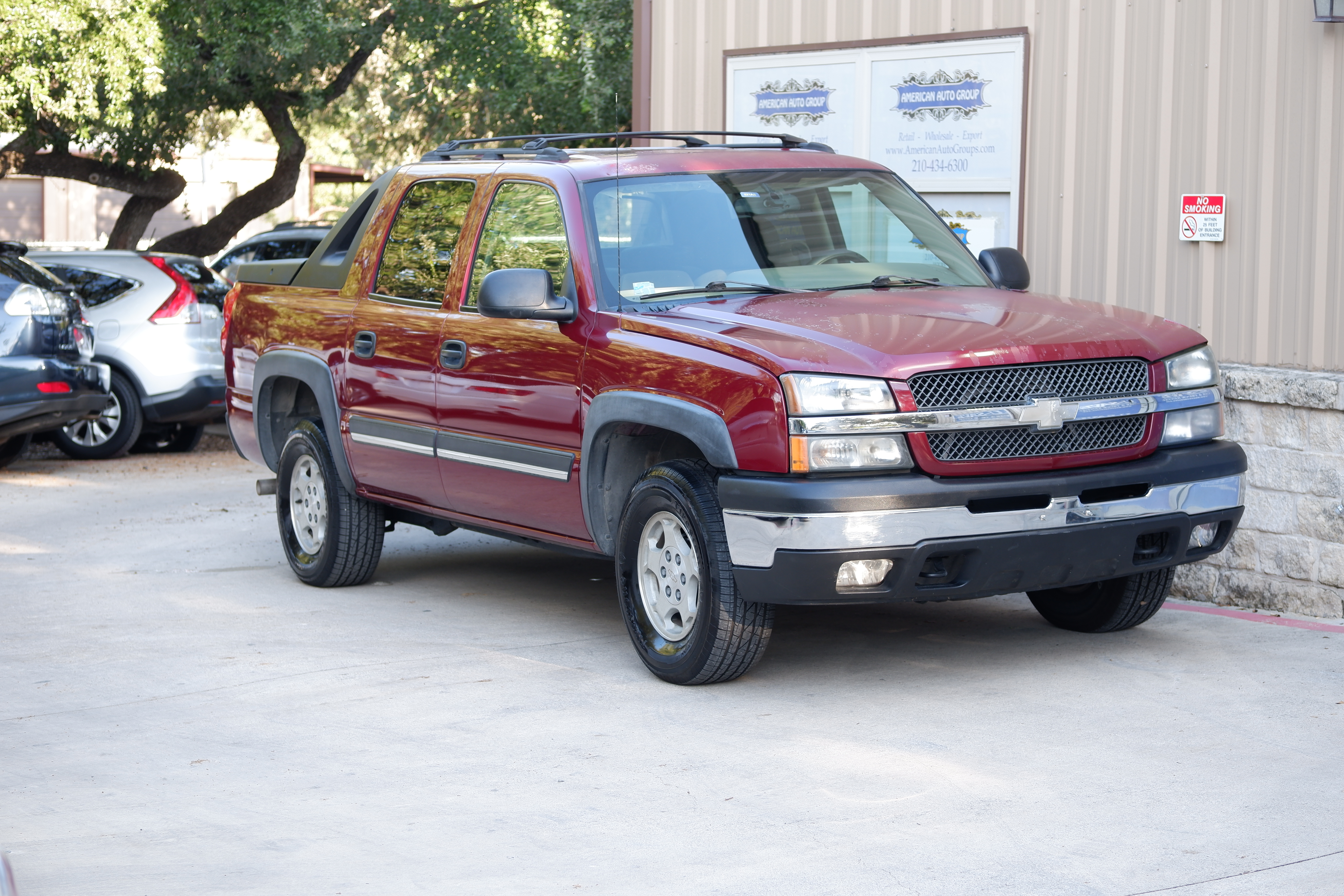 Red 2004 Chevrolet Avalanche Pickup Truck Rear-Wheel Drive Automatic
