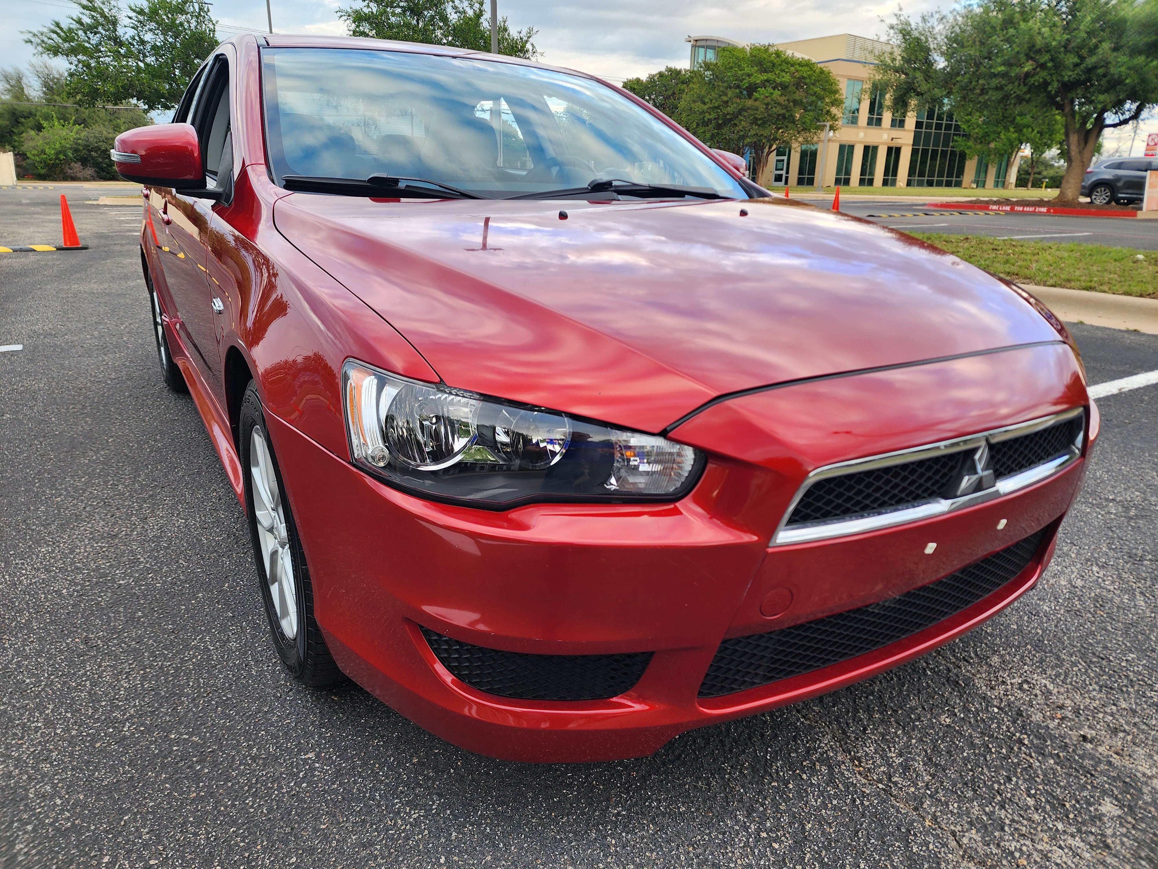 Red 2015 Mitsubishi Lancer ES FWD Sedan Front-Wheel Drive Continuously Variable Transmission