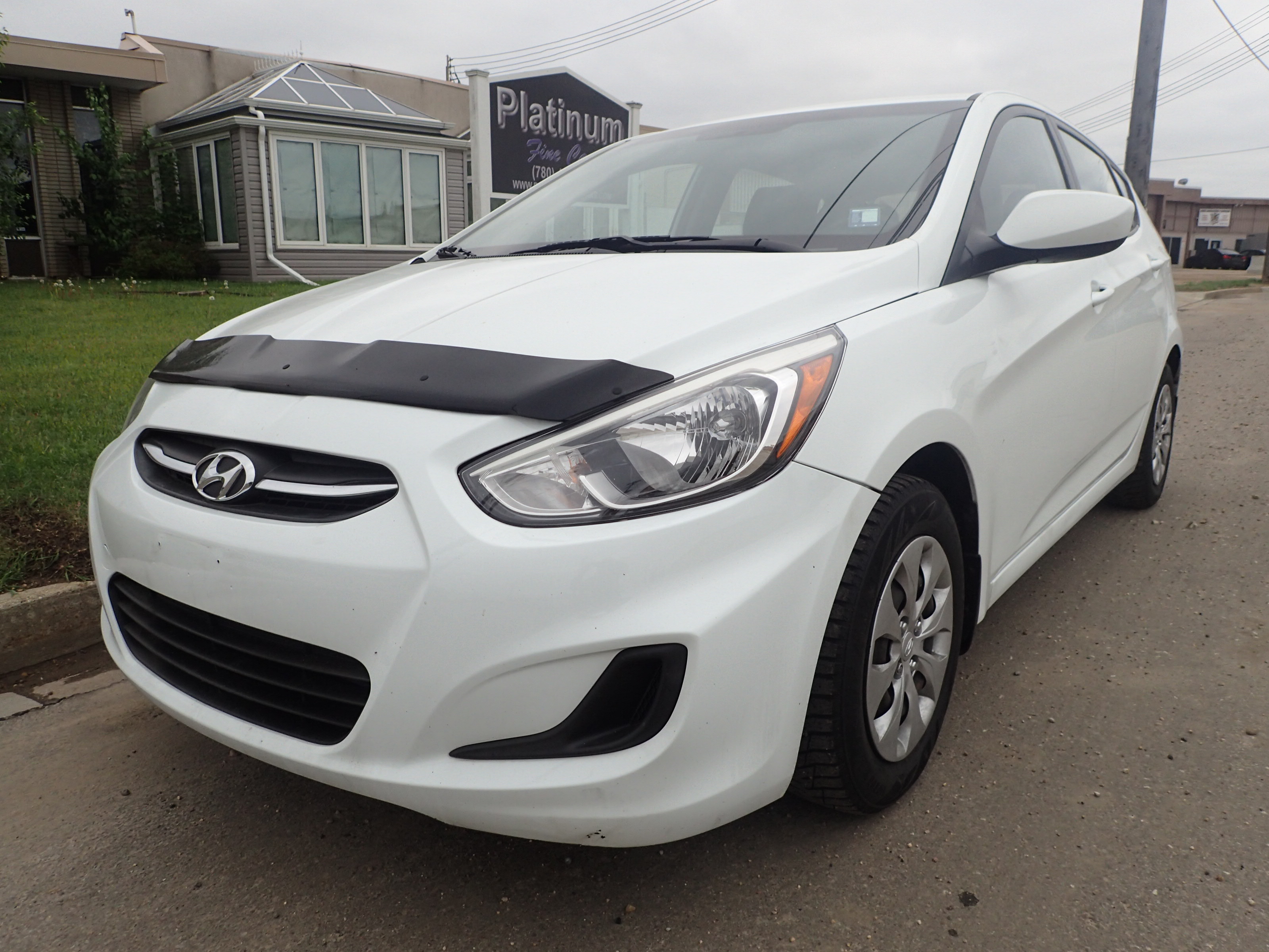 White 2016 Hyundai Accent L 4-Door Hatchback FWD Hatchback Manual