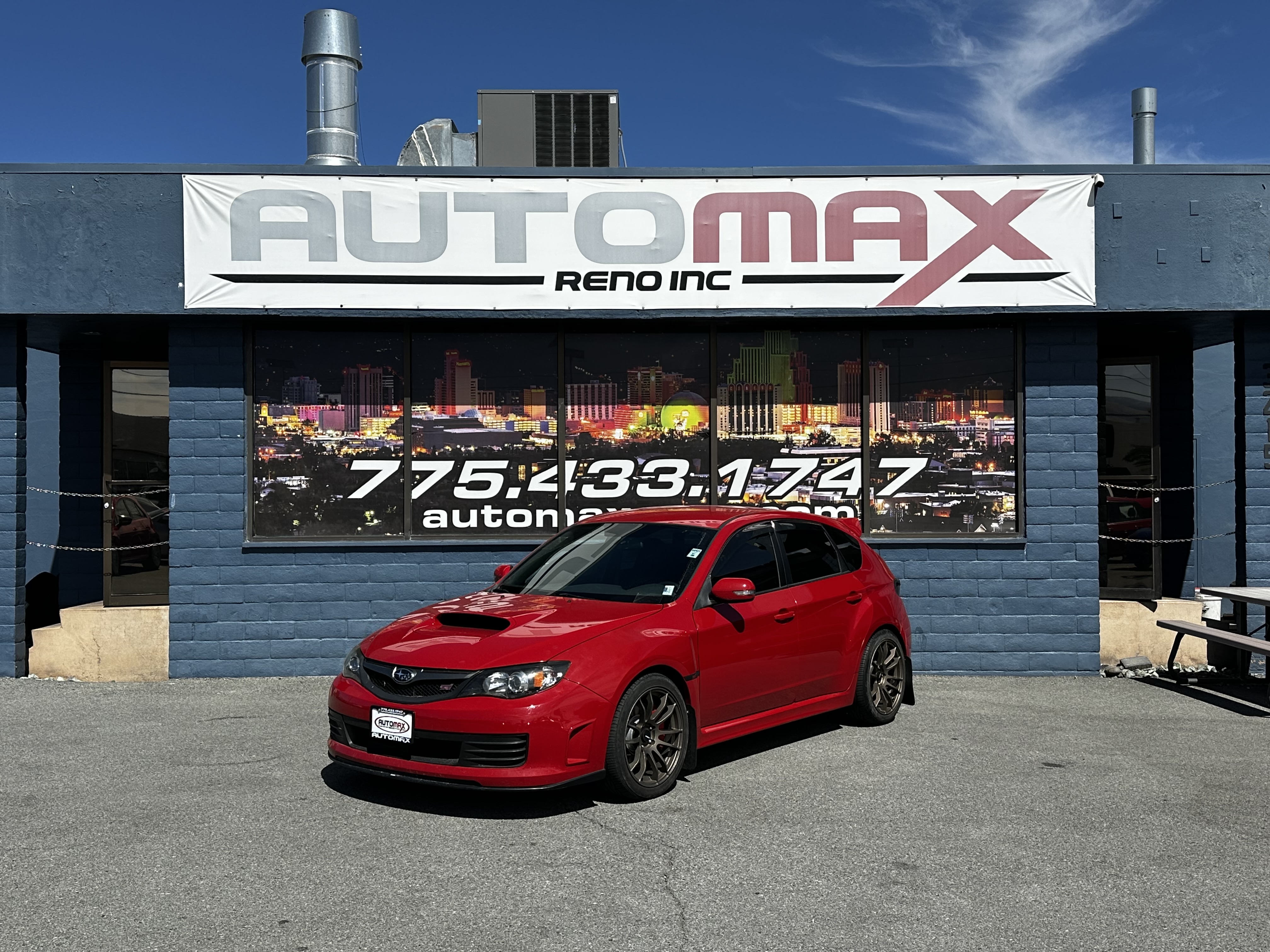 Red 2010 Subaru Impreza WRX STI Hatchback All-Wheel Drive Manual