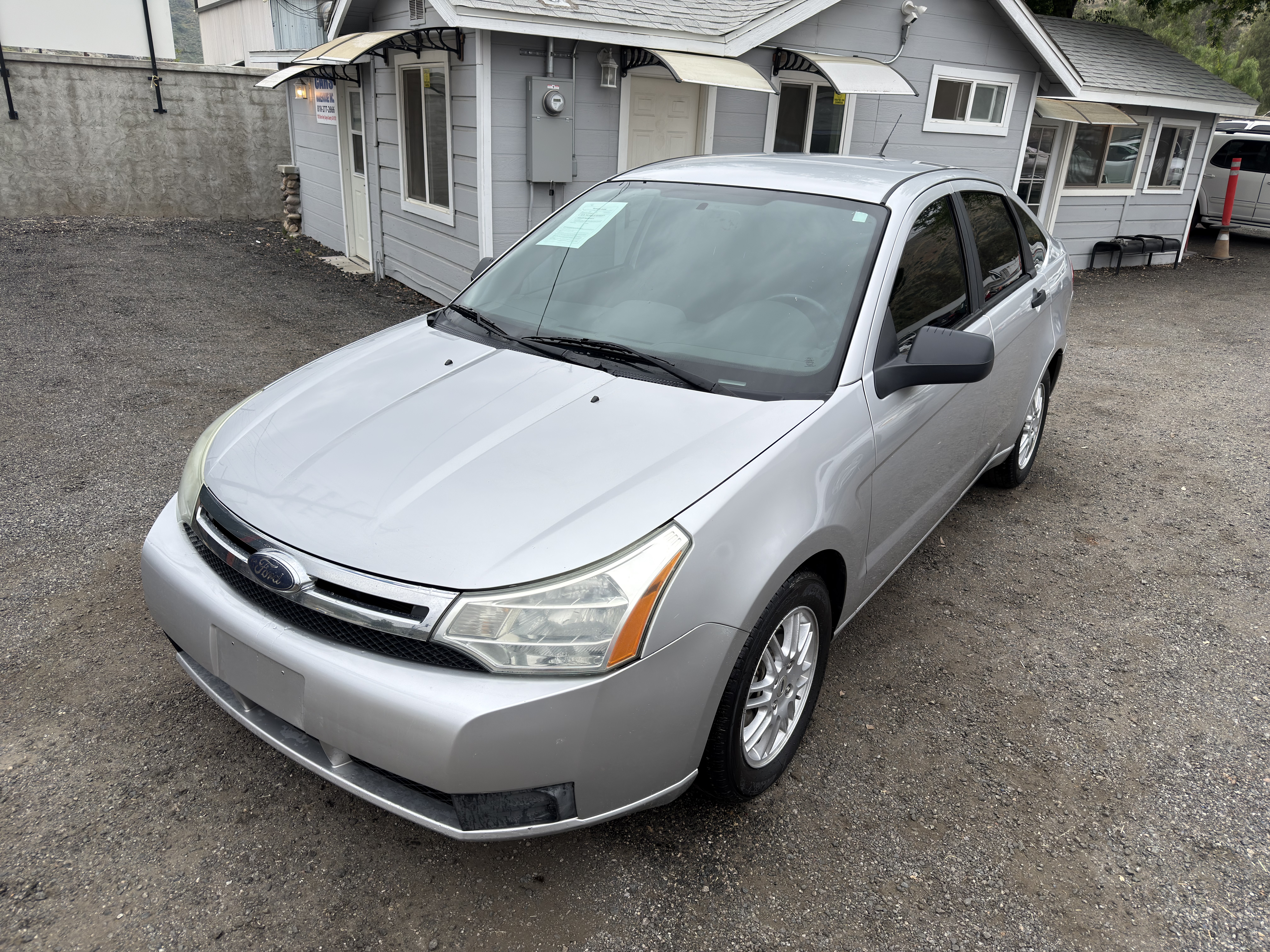 Silver 2010 Ford Focus SE Sedan Front-Wheel Drive Automatic