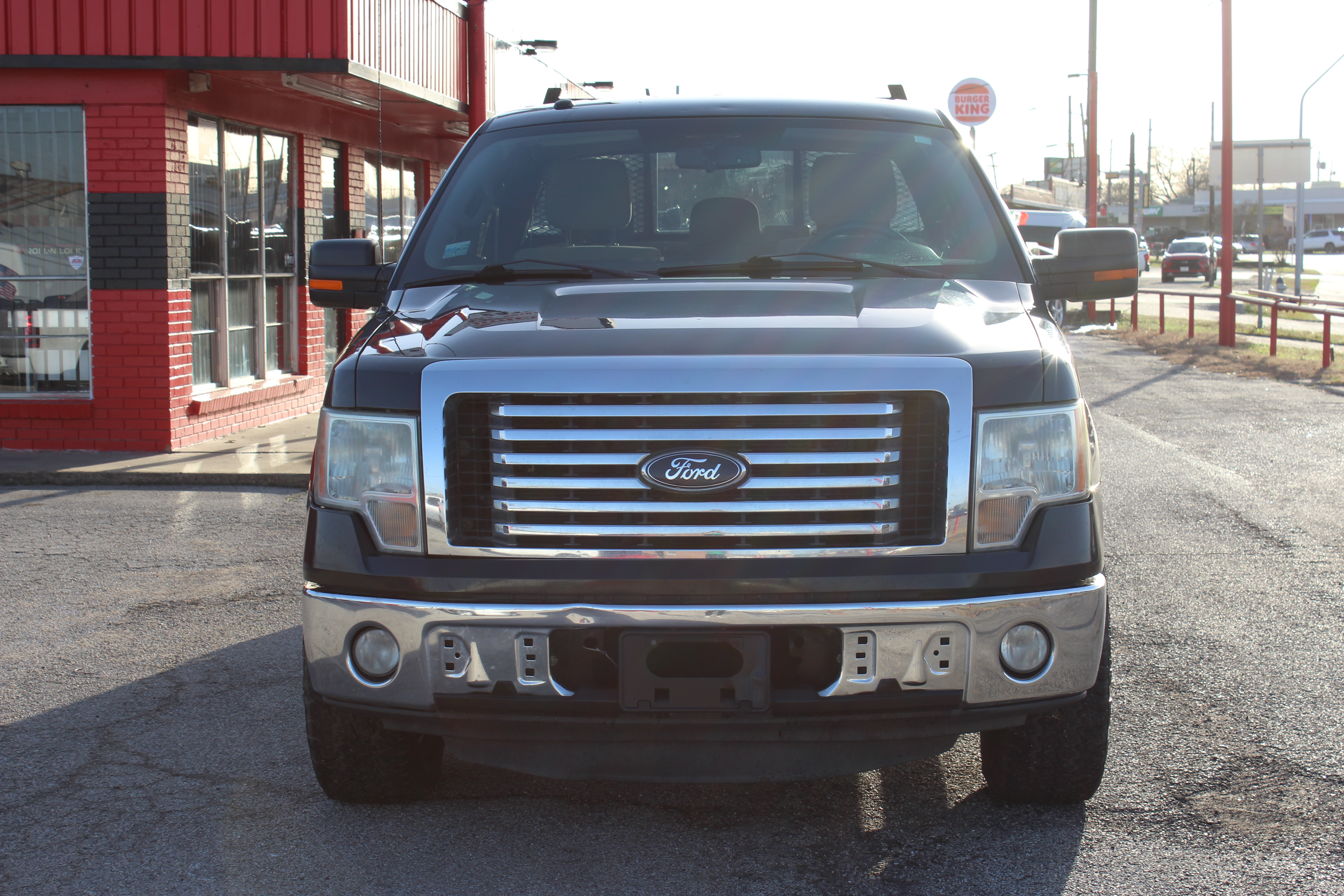 2012 Ford F-150 2WD SuperCab 145 XLT - Blue exterior view 4