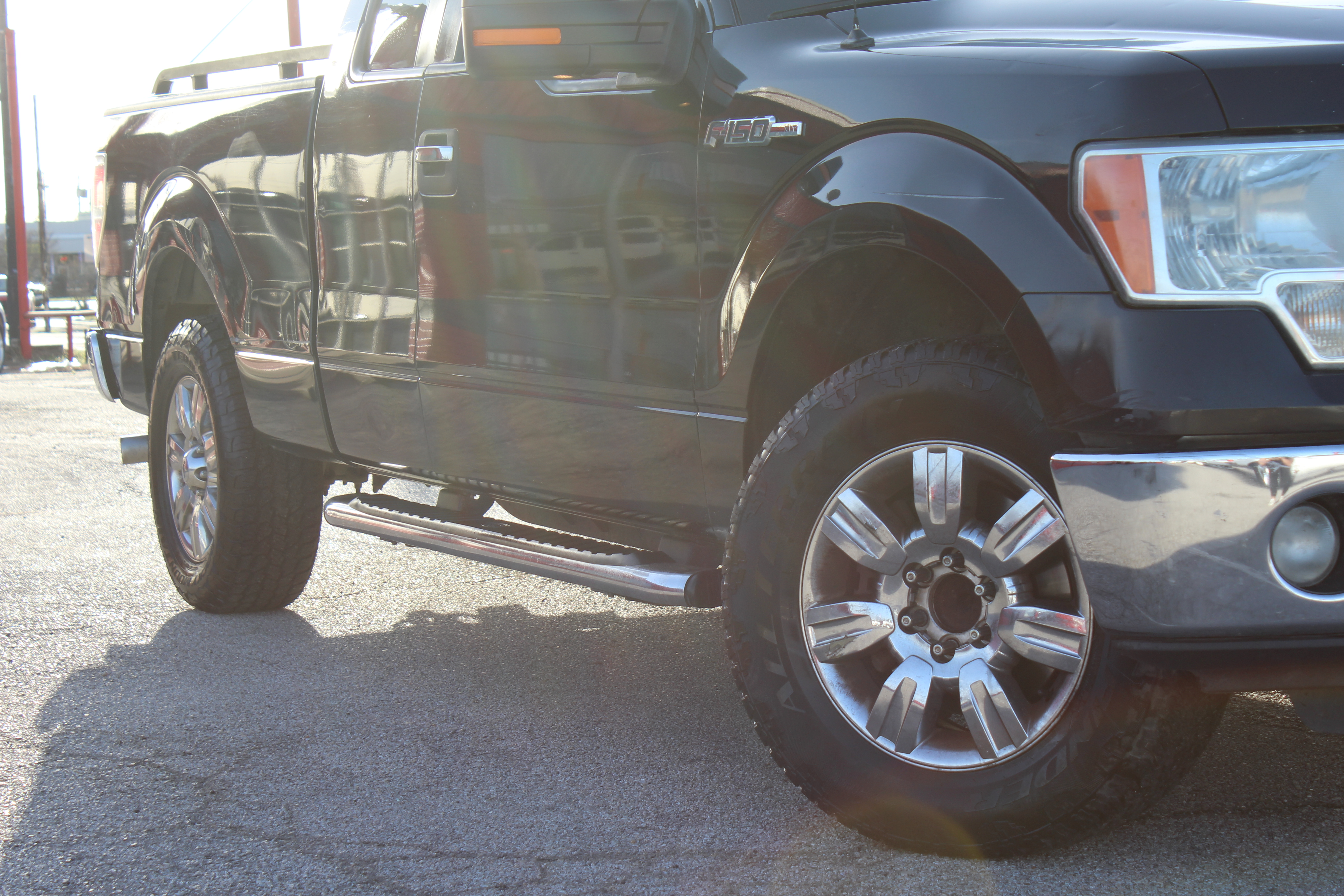 2012 Ford F-150 2WD SuperCab 145 XLT - Blue exterior view 2