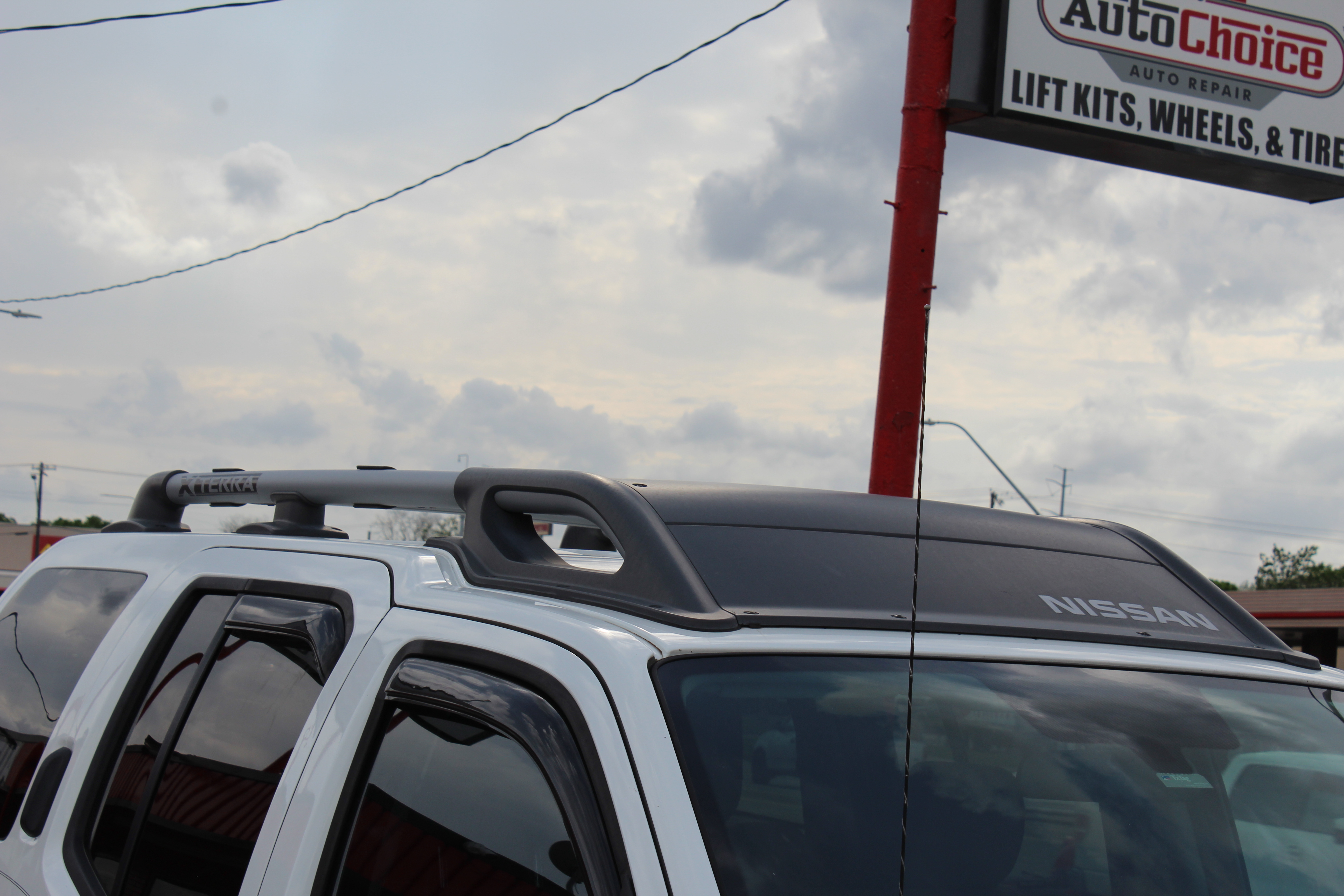 2015 Nissan Xterra 2WD 4dr Auto S - White exterior view 6