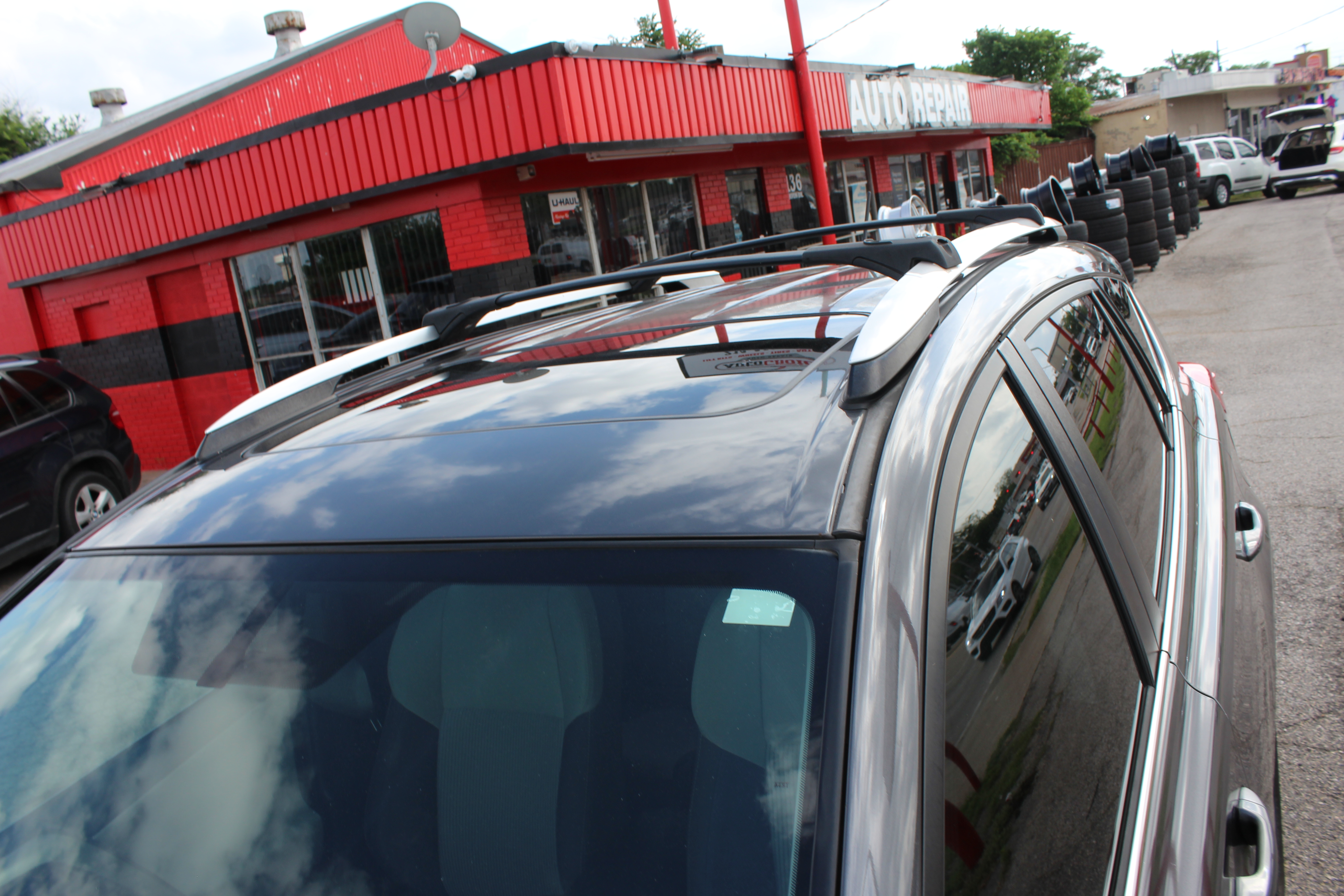 2015 Toyota RAV4 FWD 4dr XLE (Natl) - Gray exterior view 4