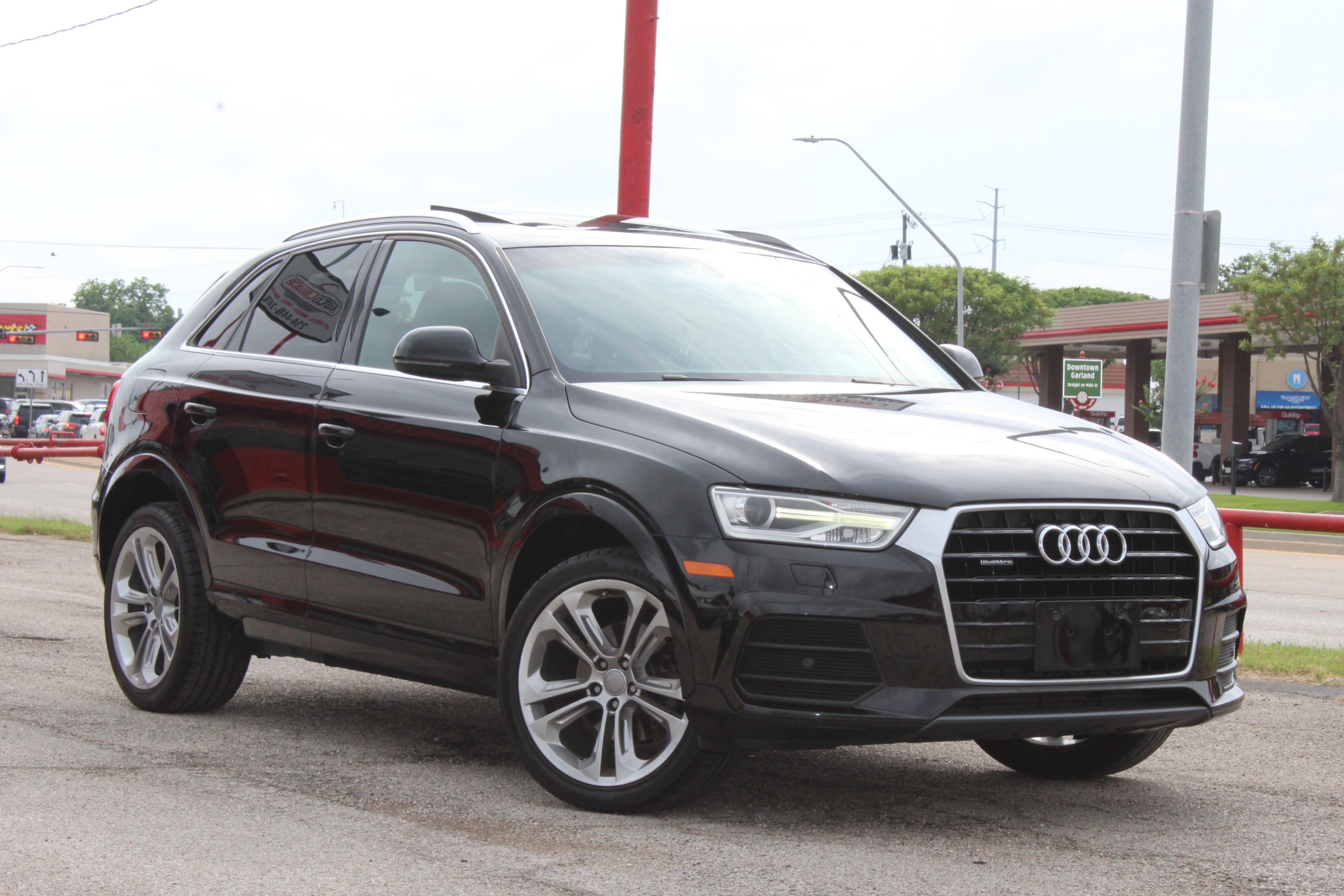 2016 Audi Q3 quattro 4dr Premium Plus - Black exterior view 2