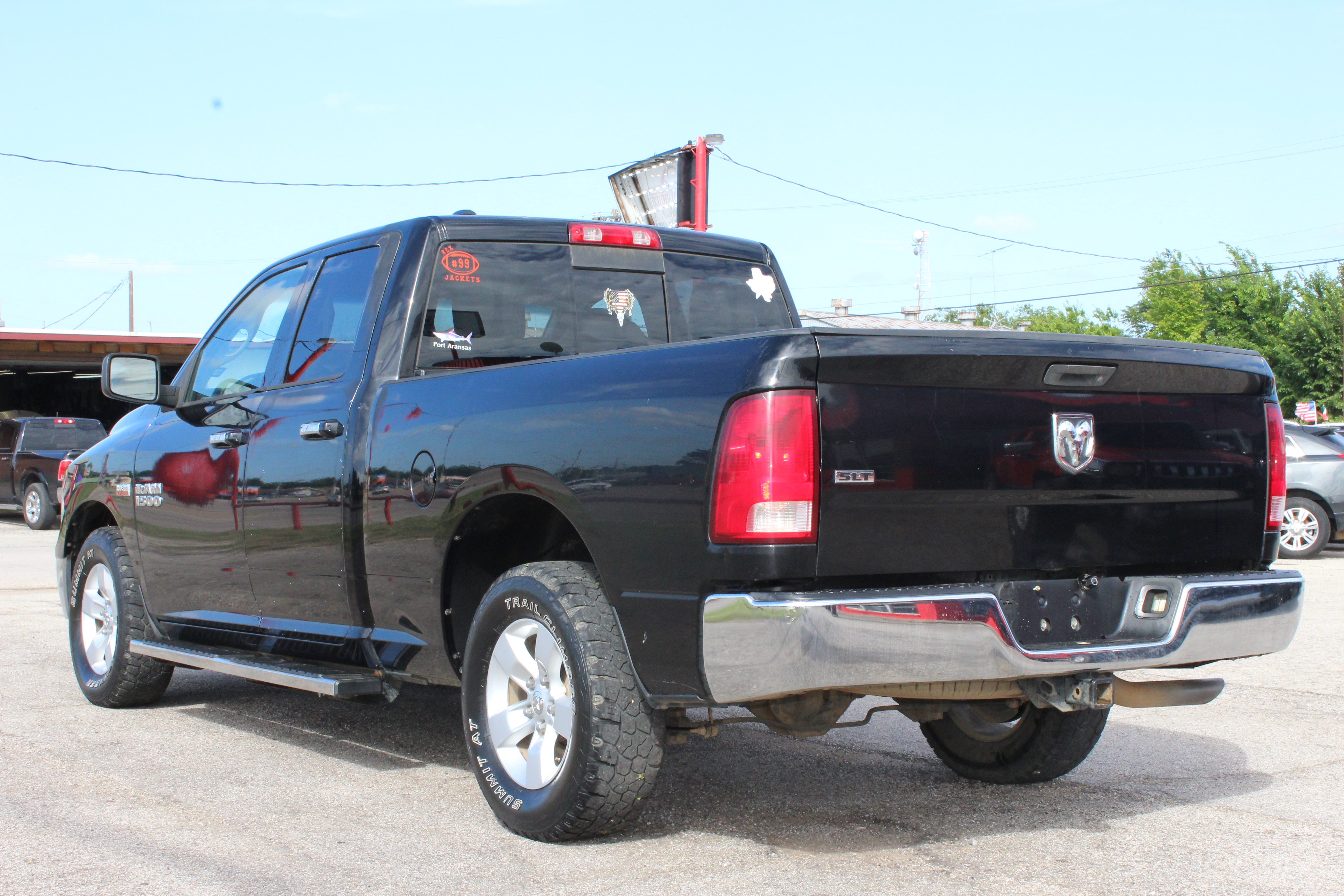 2014 RAM 1500 2WD Quad Cab 140.5 SLT - Black exterior view 8