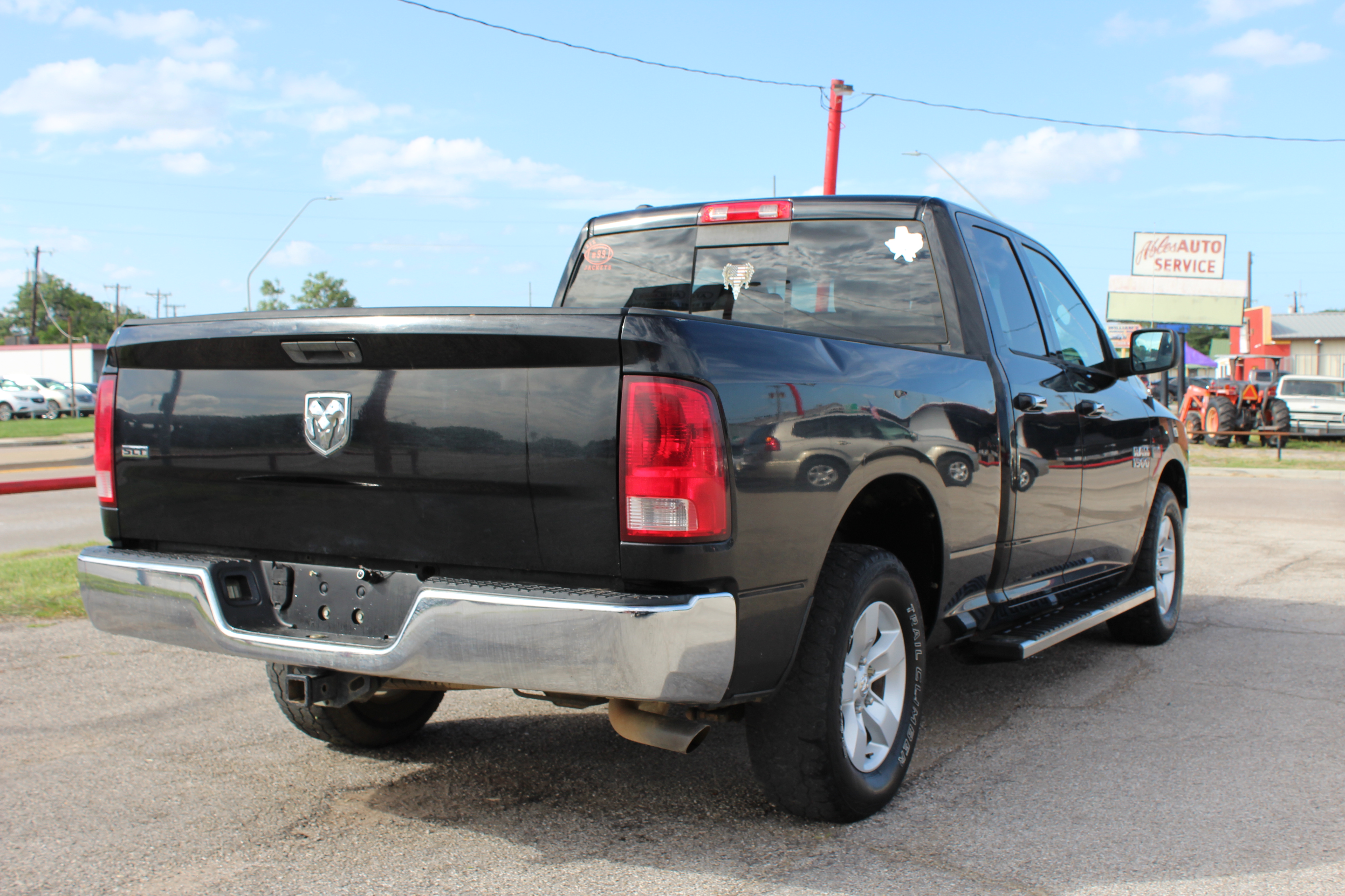 2014 RAM 1500 2WD Quad Cab 140.5 SLT - Black exterior view 11