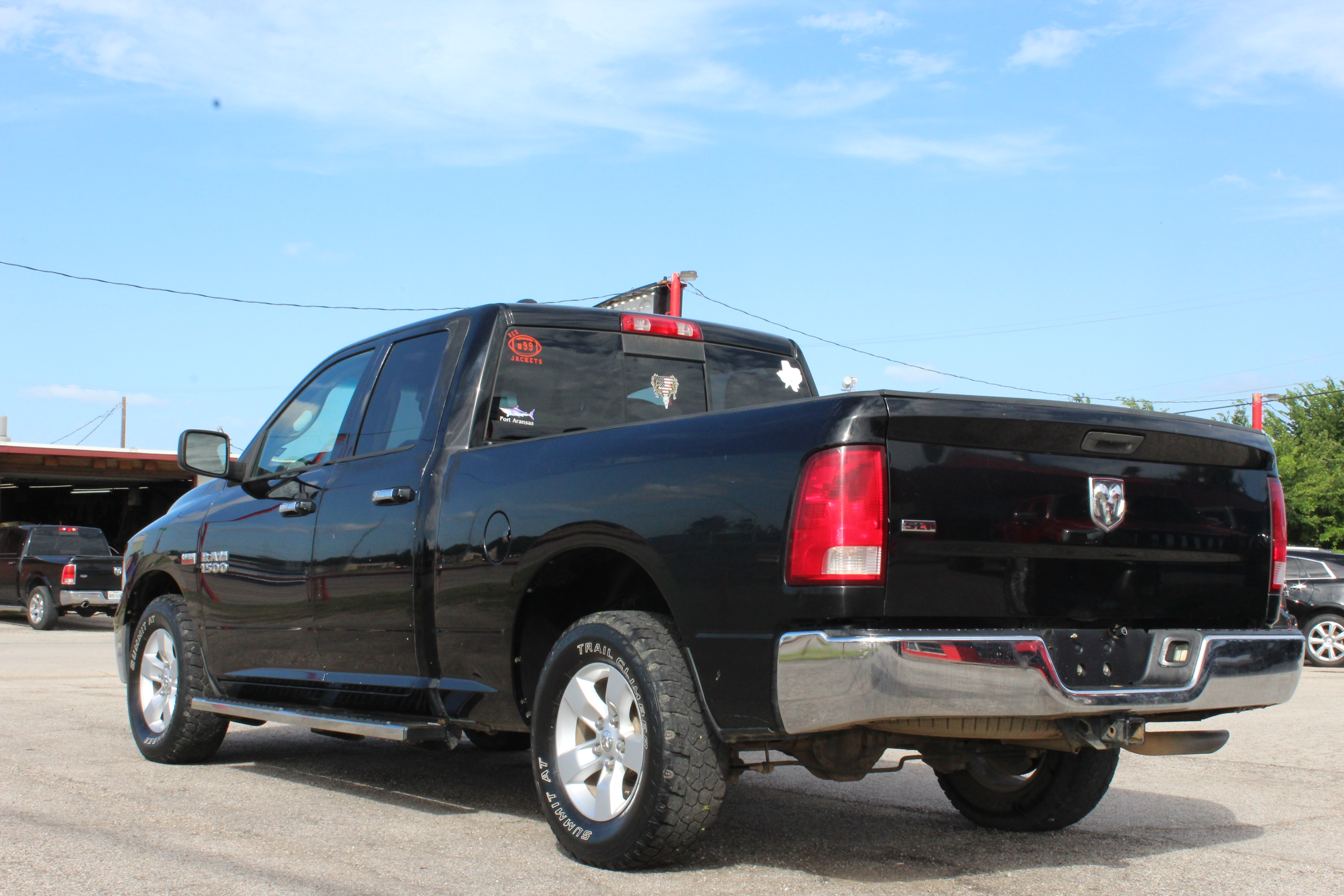 2014 RAM 1500 2WD Quad Cab 140.5 SLT - Black exterior view 9