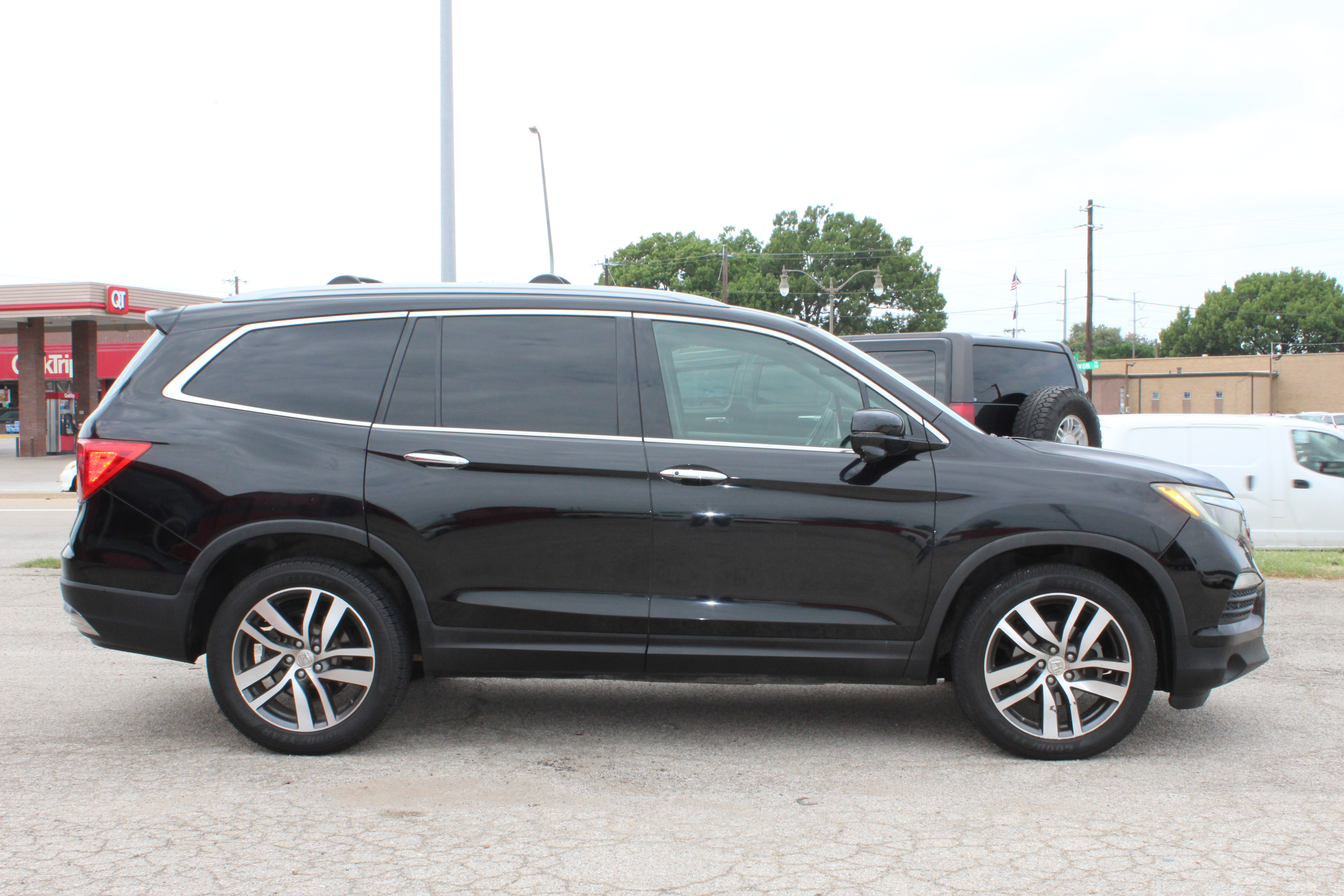 2016 Honda Pilot AWD 4dr Touring w/RES & Navi - Black exterior view 10