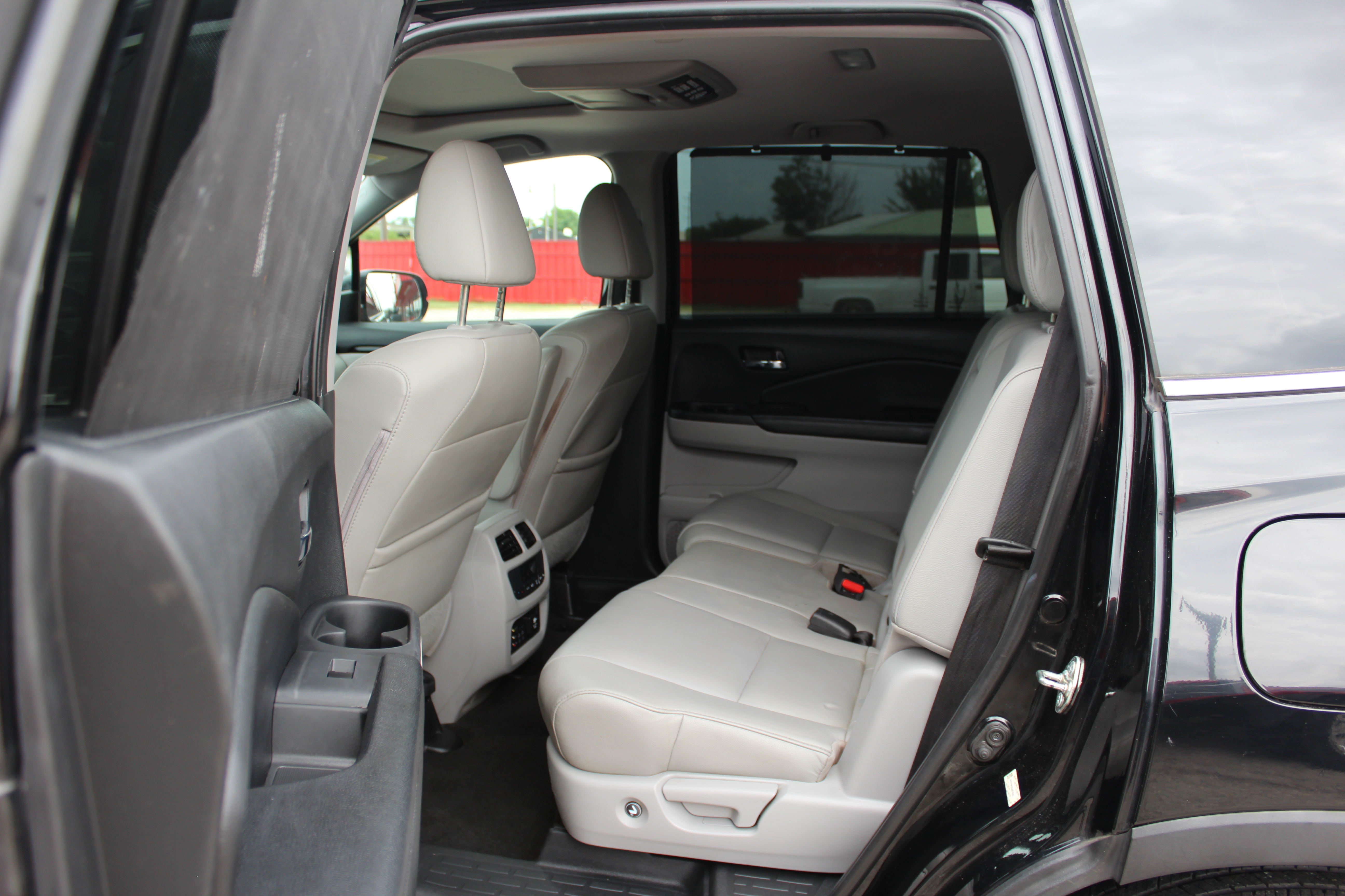2016 Honda Pilot AWD 4dr Touring w/RES & Navi - Black exterior view 20