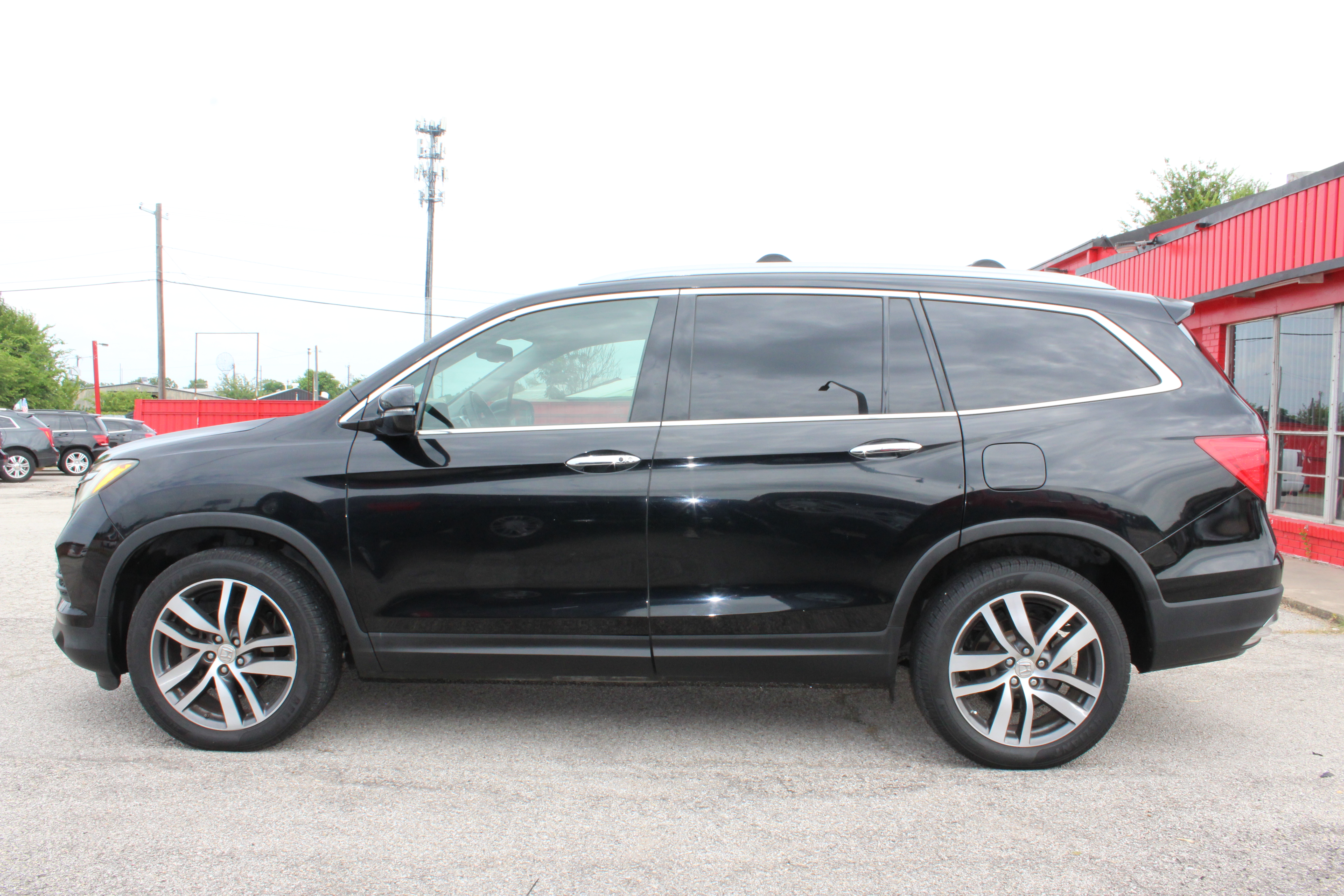 2016 Honda Pilot AWD 4dr Touring w/RES & Navi - Black exterior view 6