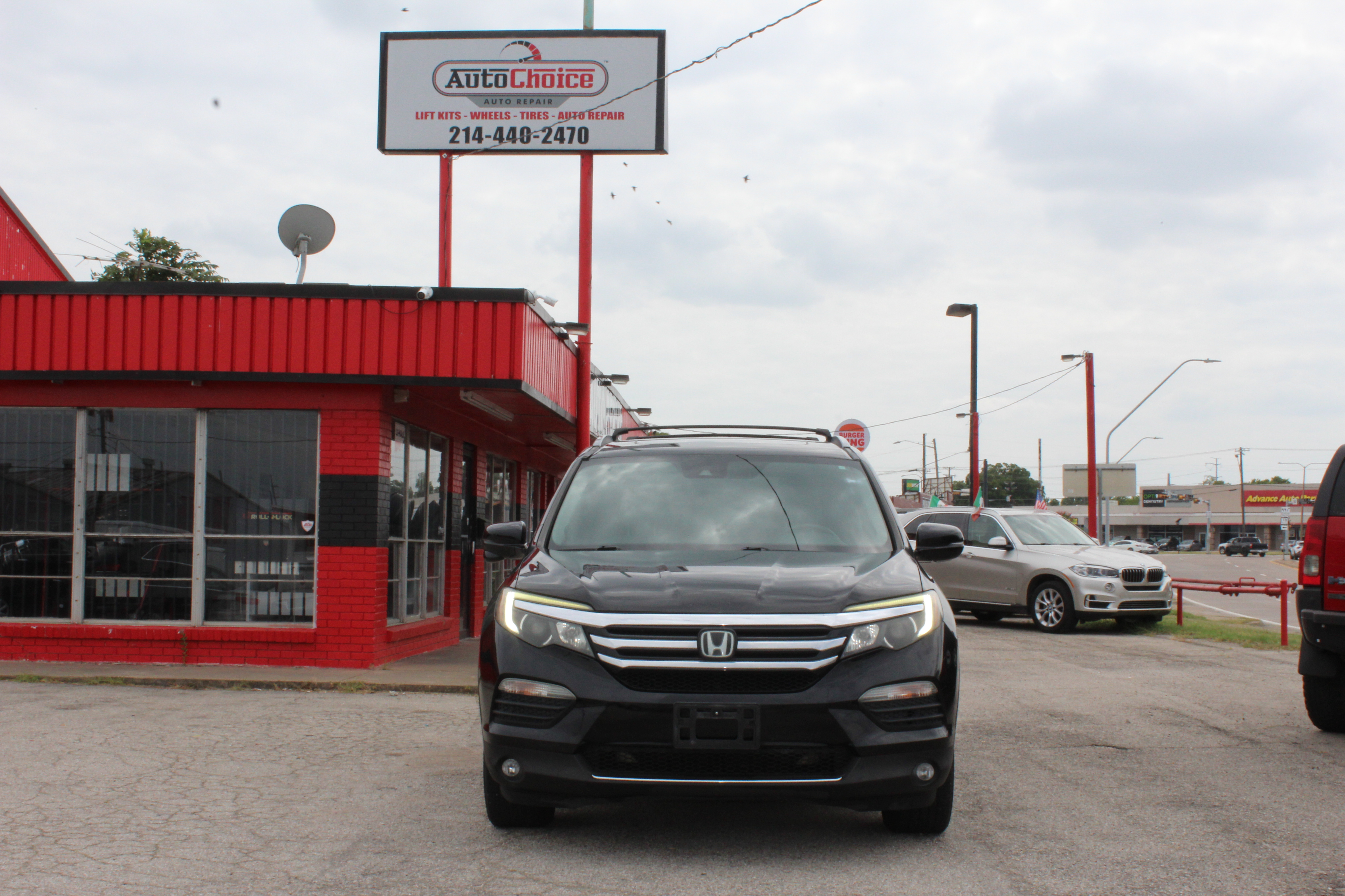2016 Honda Pilot AWD 4dr Touring w/RES & Navi - Black exterior view 2