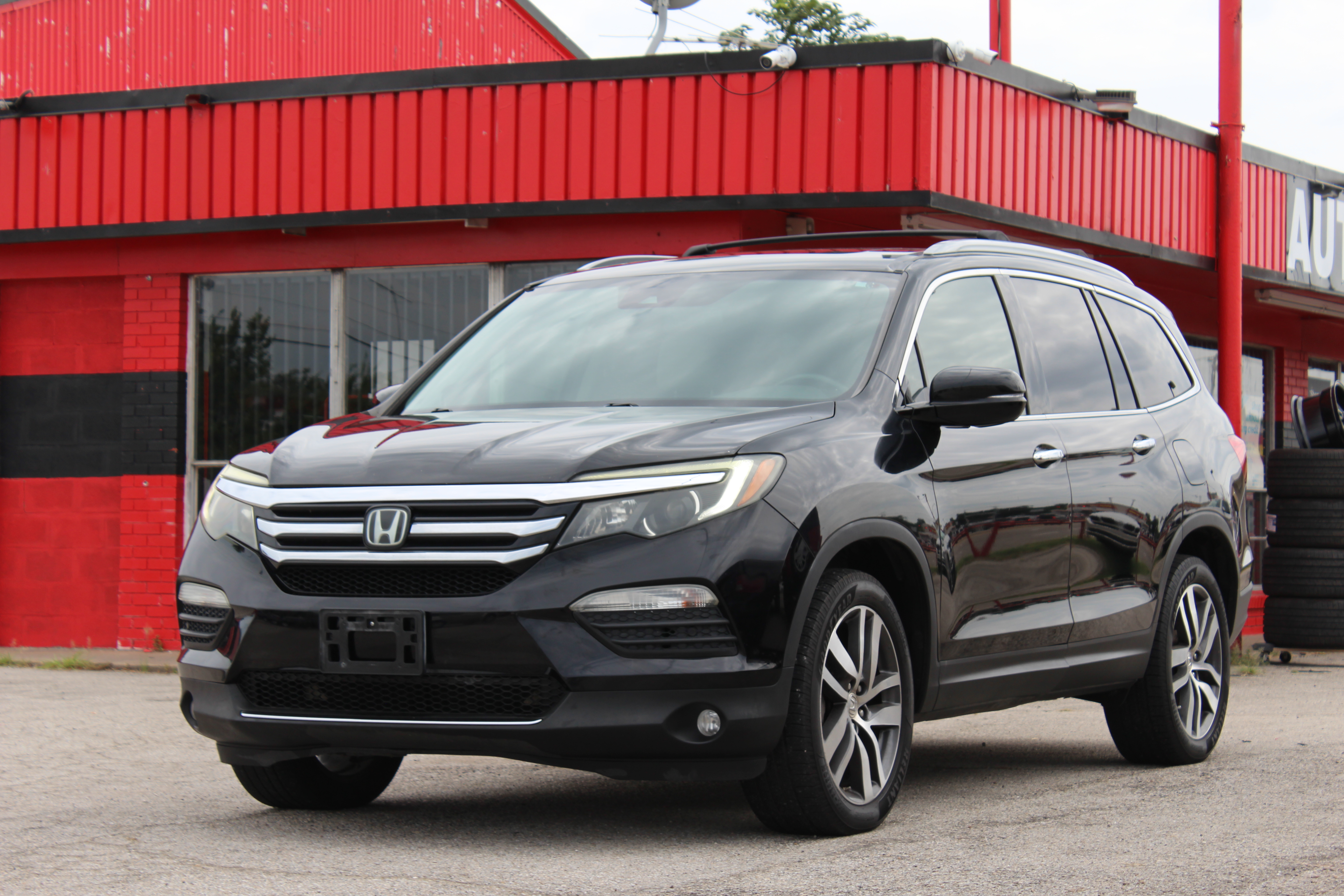 2016 Honda Pilot AWD 4dr Touring w/RES & Navi - Black exterior view 5