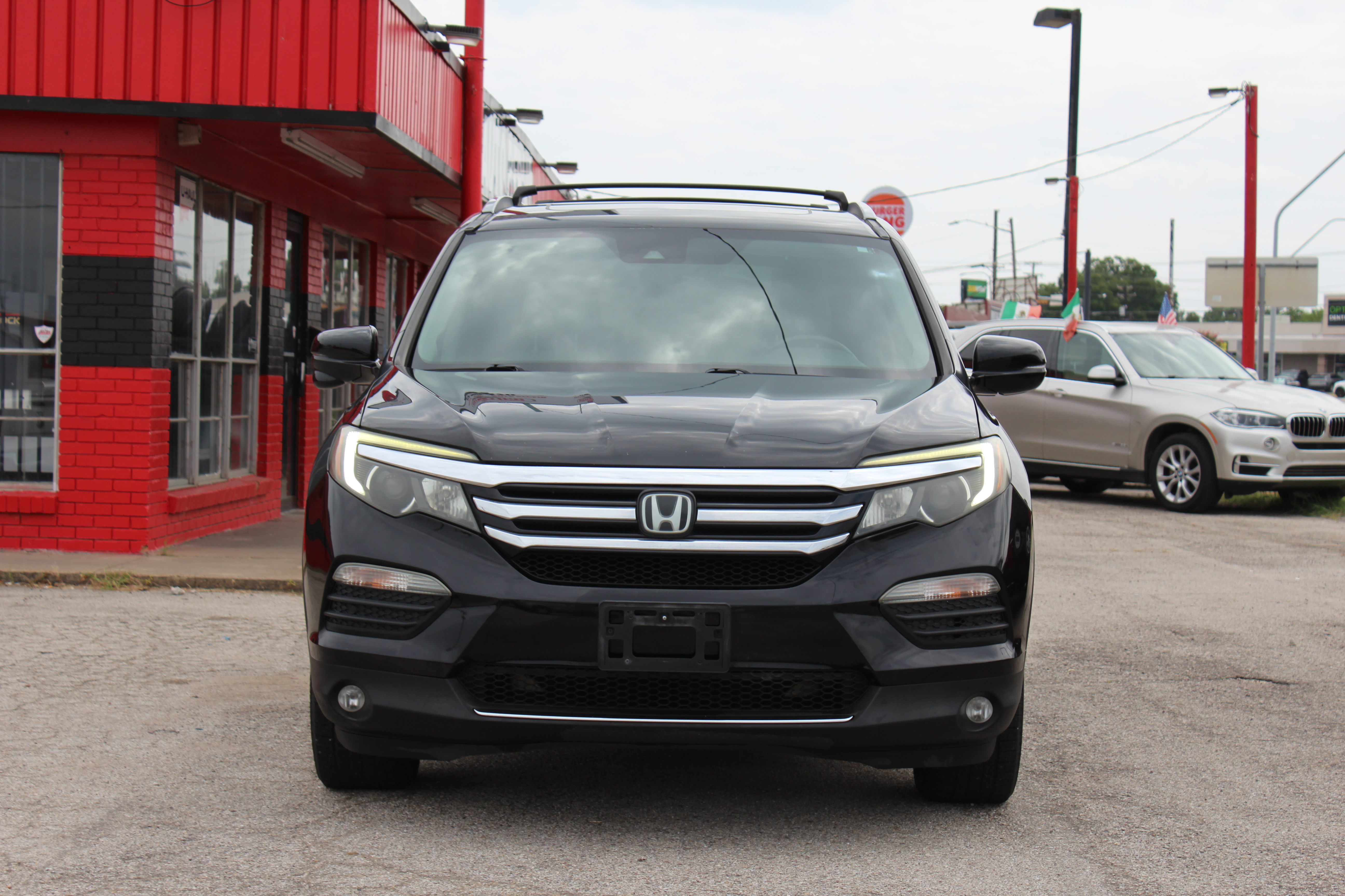 2016 Honda Pilot AWD 4dr Touring w/RES & Navi - Black exterior view 3