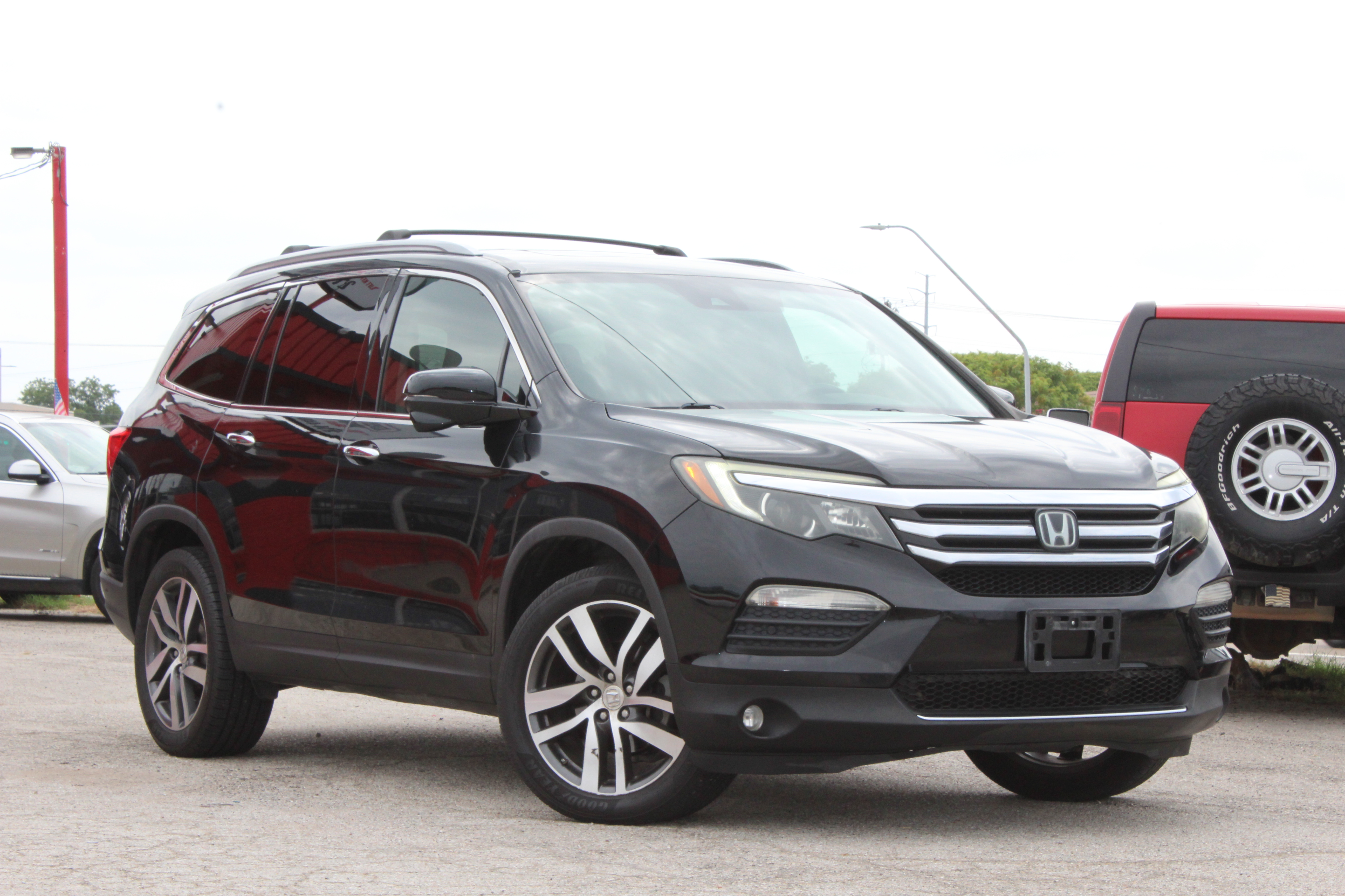 2016 Honda Pilot AWD 4dr Touring w/RES & Navi - Black exterior view 1