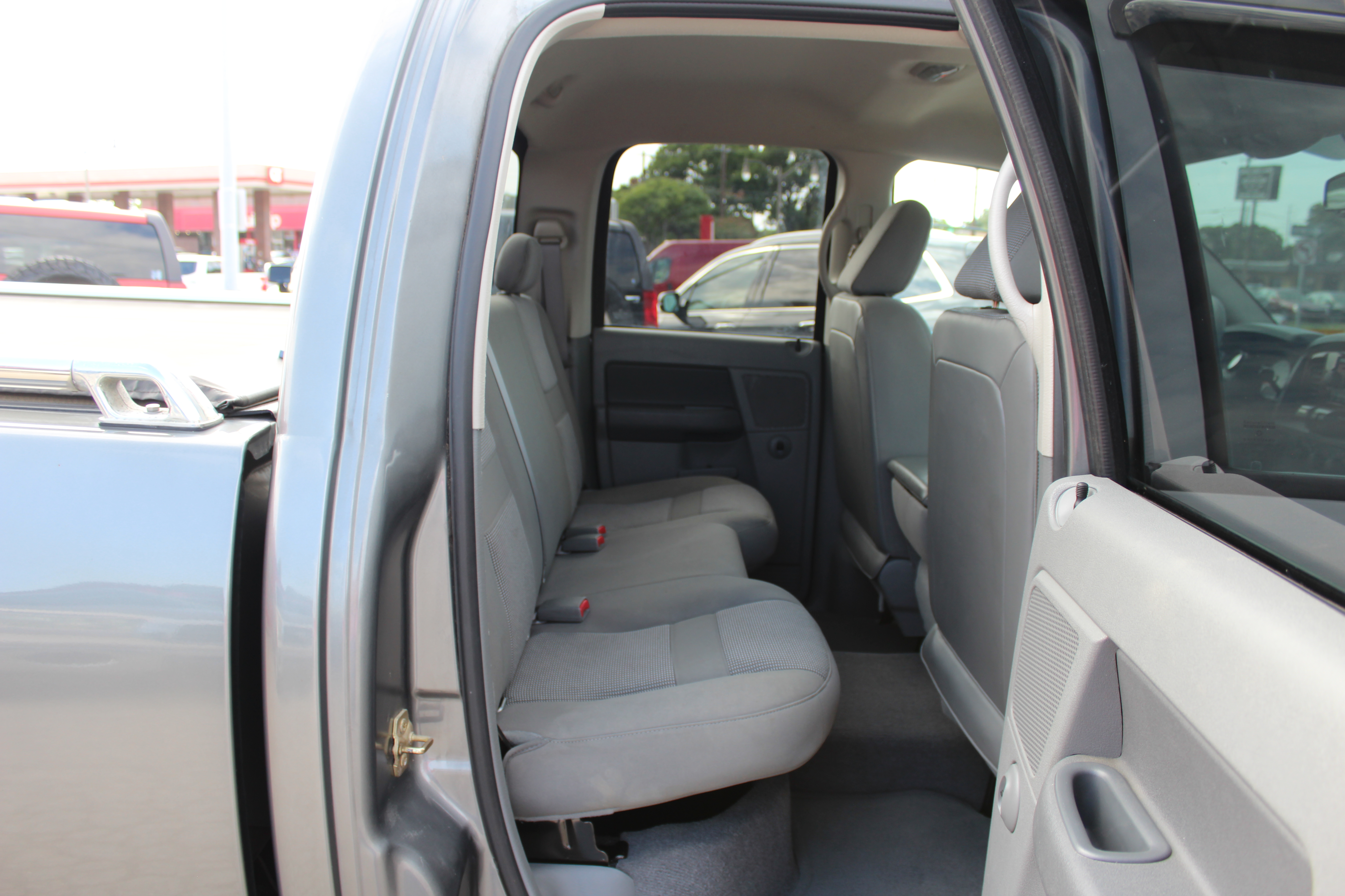 2006 Dodge Ram 1500 4dr Quad Cab 140.5 4WD SLT - Gold exterior view 20